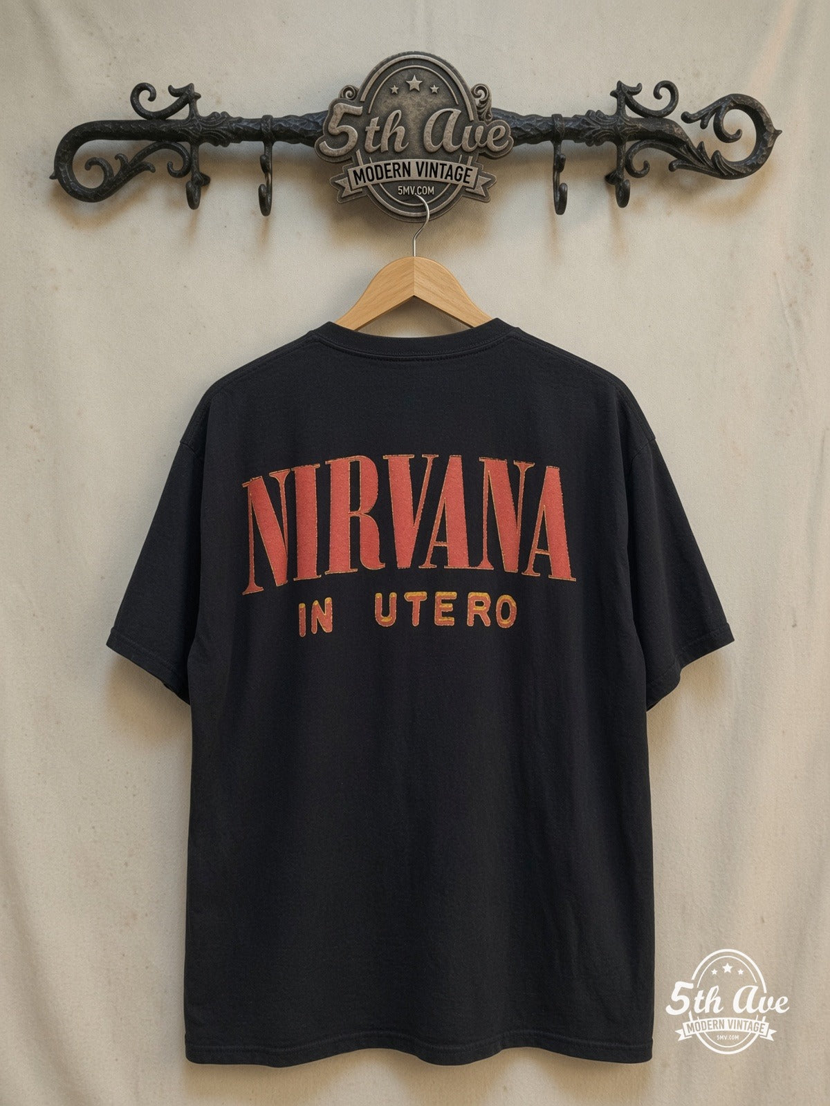Nirvana – In Utero Red Logo Pink Wings Angel – Vintage Band T-Shirt back on locked cream ornate 5th Ave rack