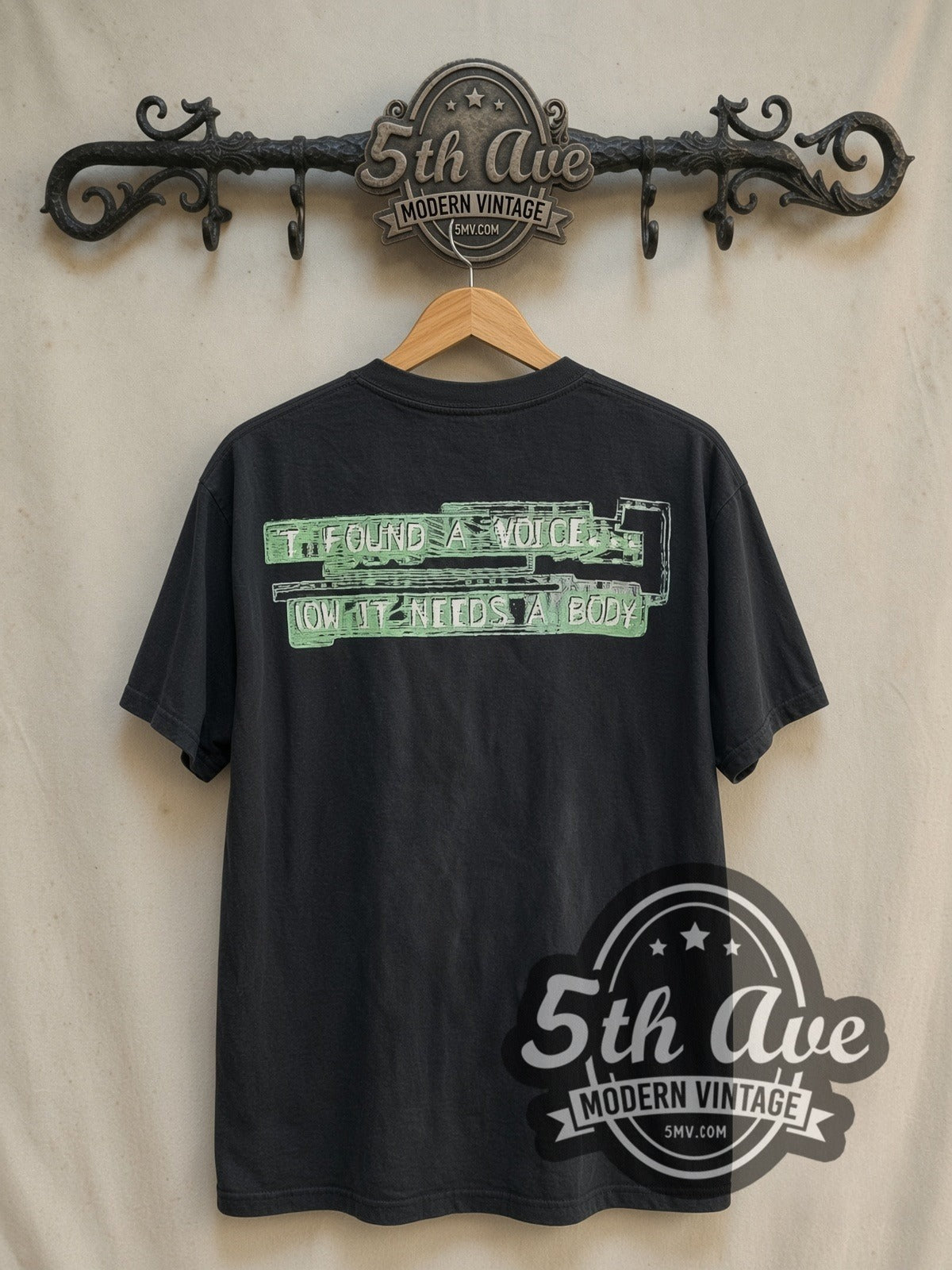 Ghost in the Shell It Found a Voice vintage graphic t-shirt, back view on a display rack