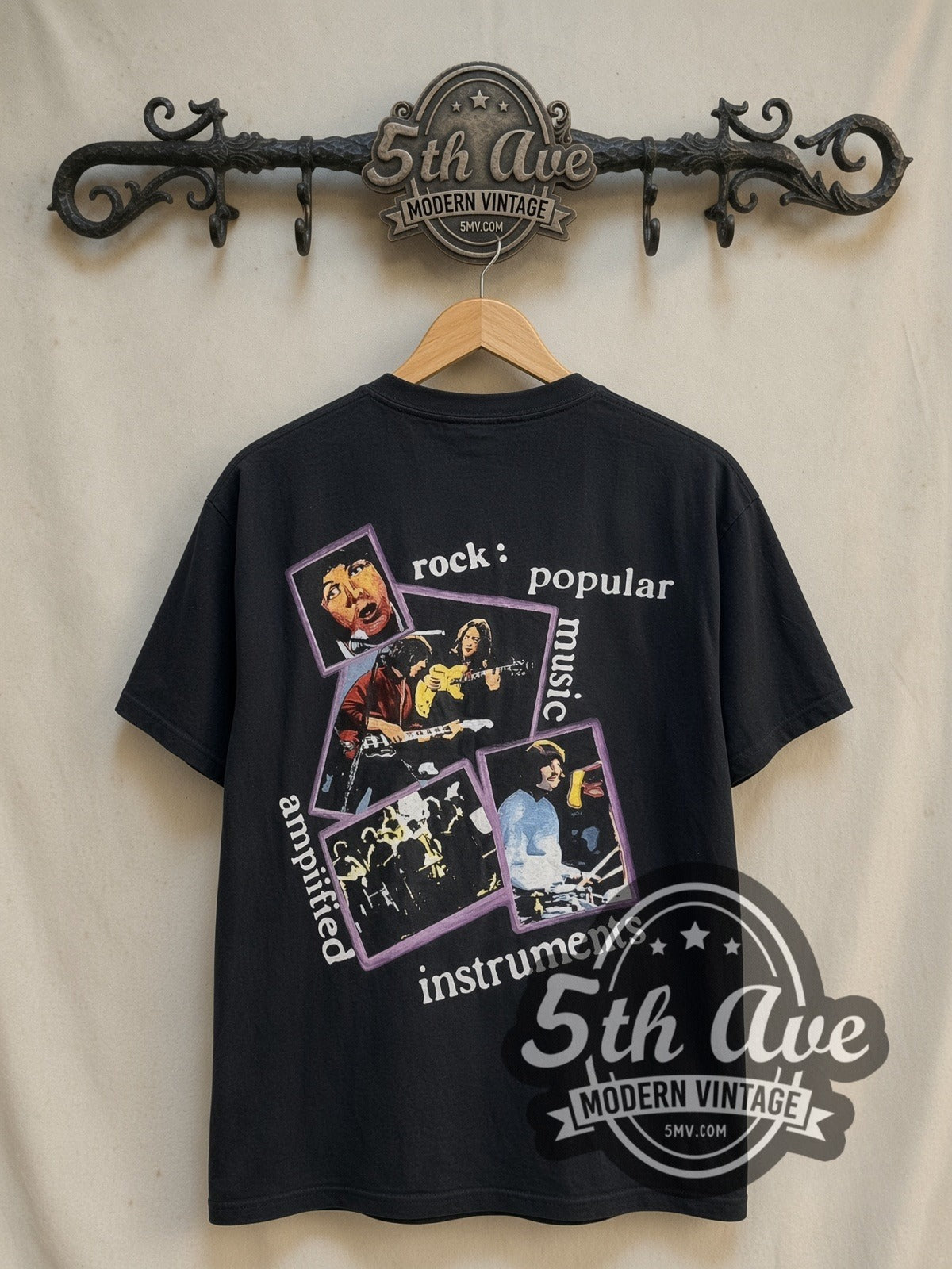 The Beatles Definition of Rock vintage band t-shirt in black, back view on a display rack