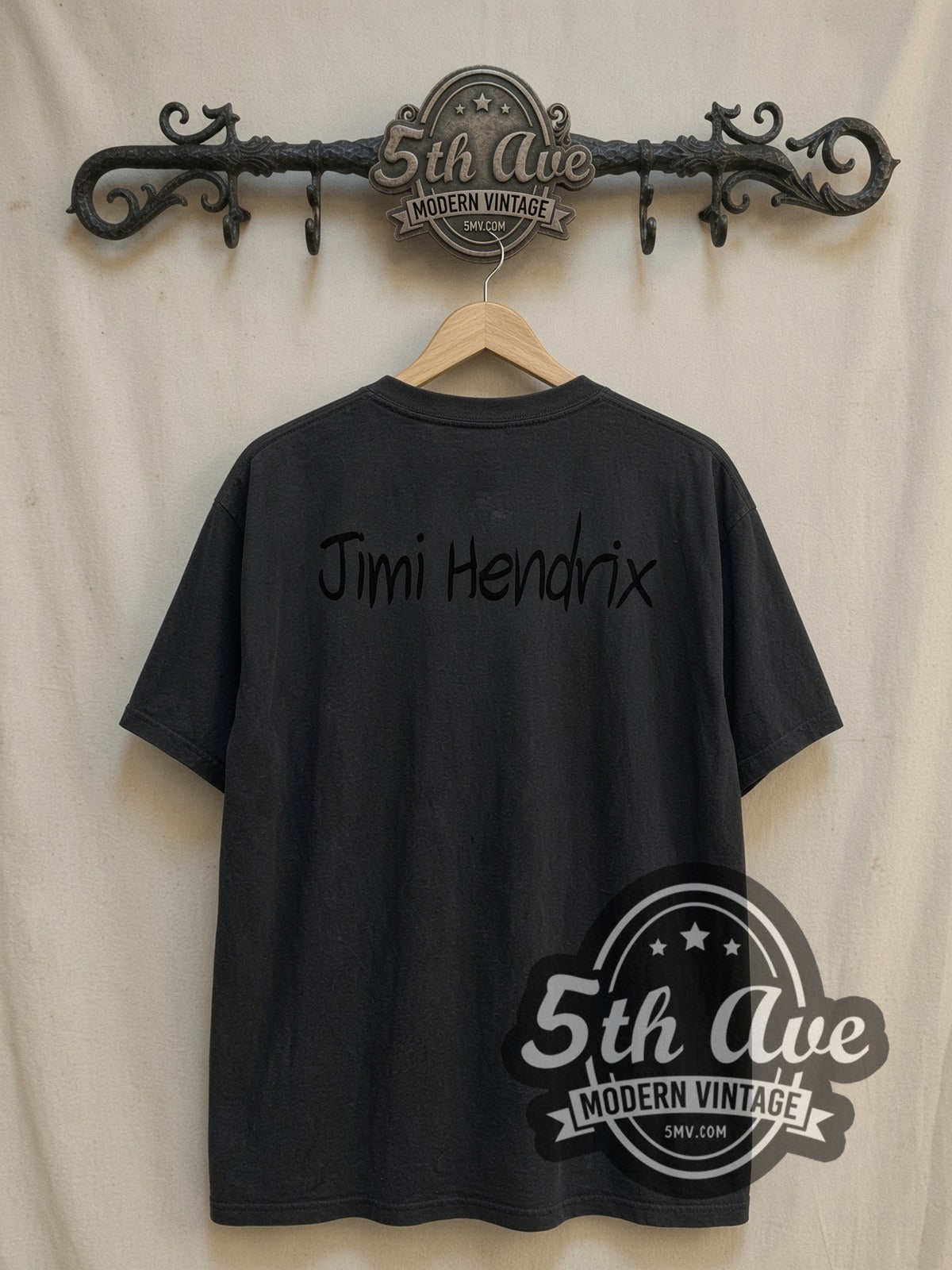 Jimi Hendrix Multi Photo Collage Red Script vintage band t-shirt, back view on a display rack
