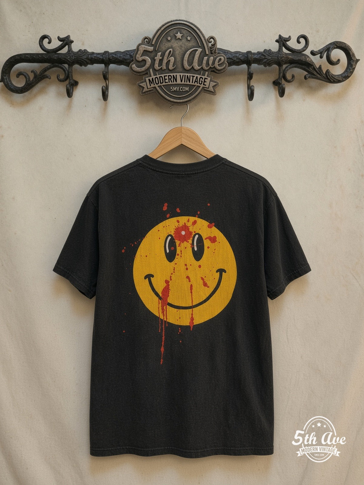 Smiley Face Bullet Hole – Vintage Band T-Shirt — back on locked cream ornate 5th Ave rack