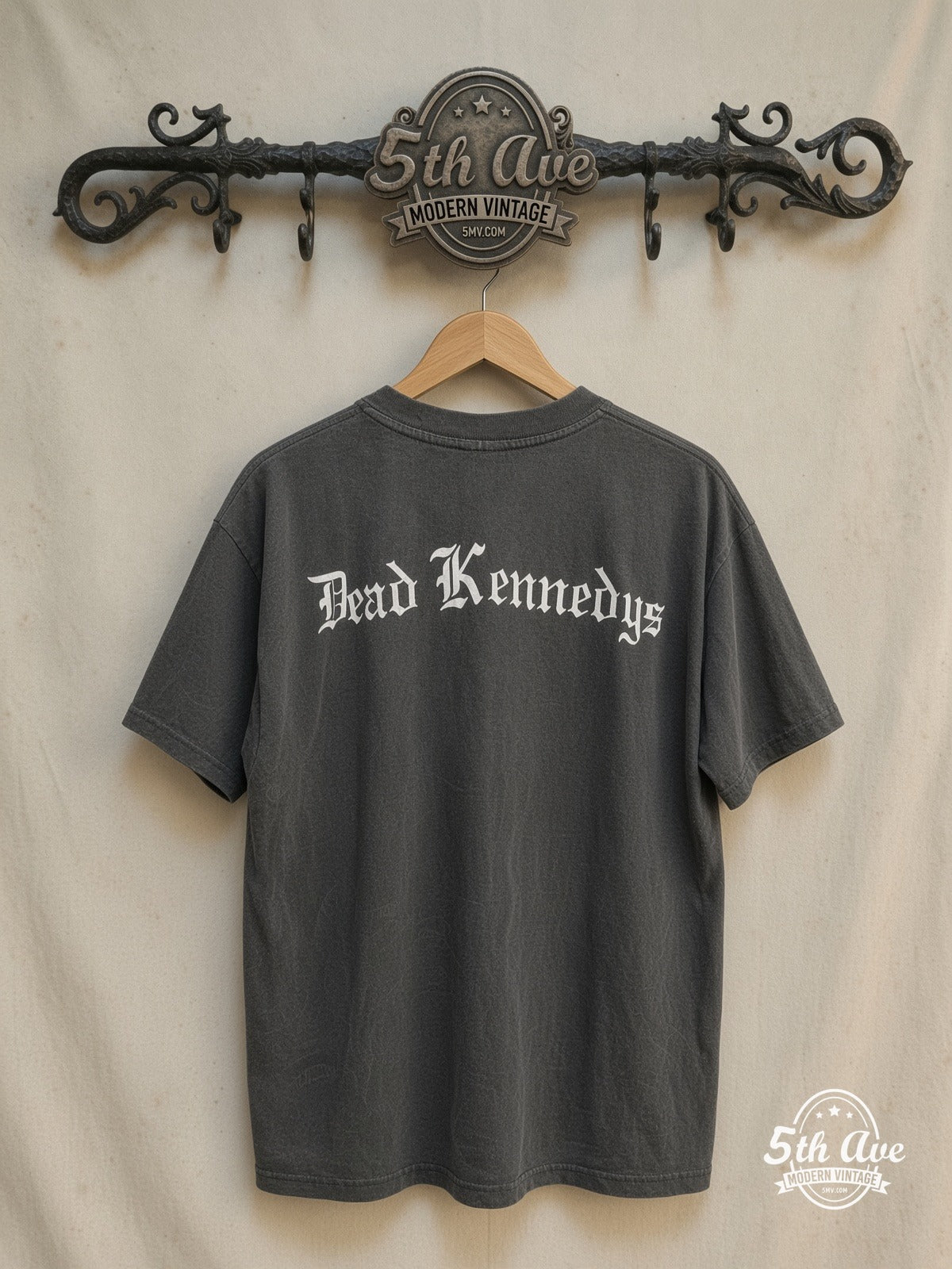 Dead Kennedys – Vintage Band T-Shirt — back on locked cream ornate 5th Ave rack