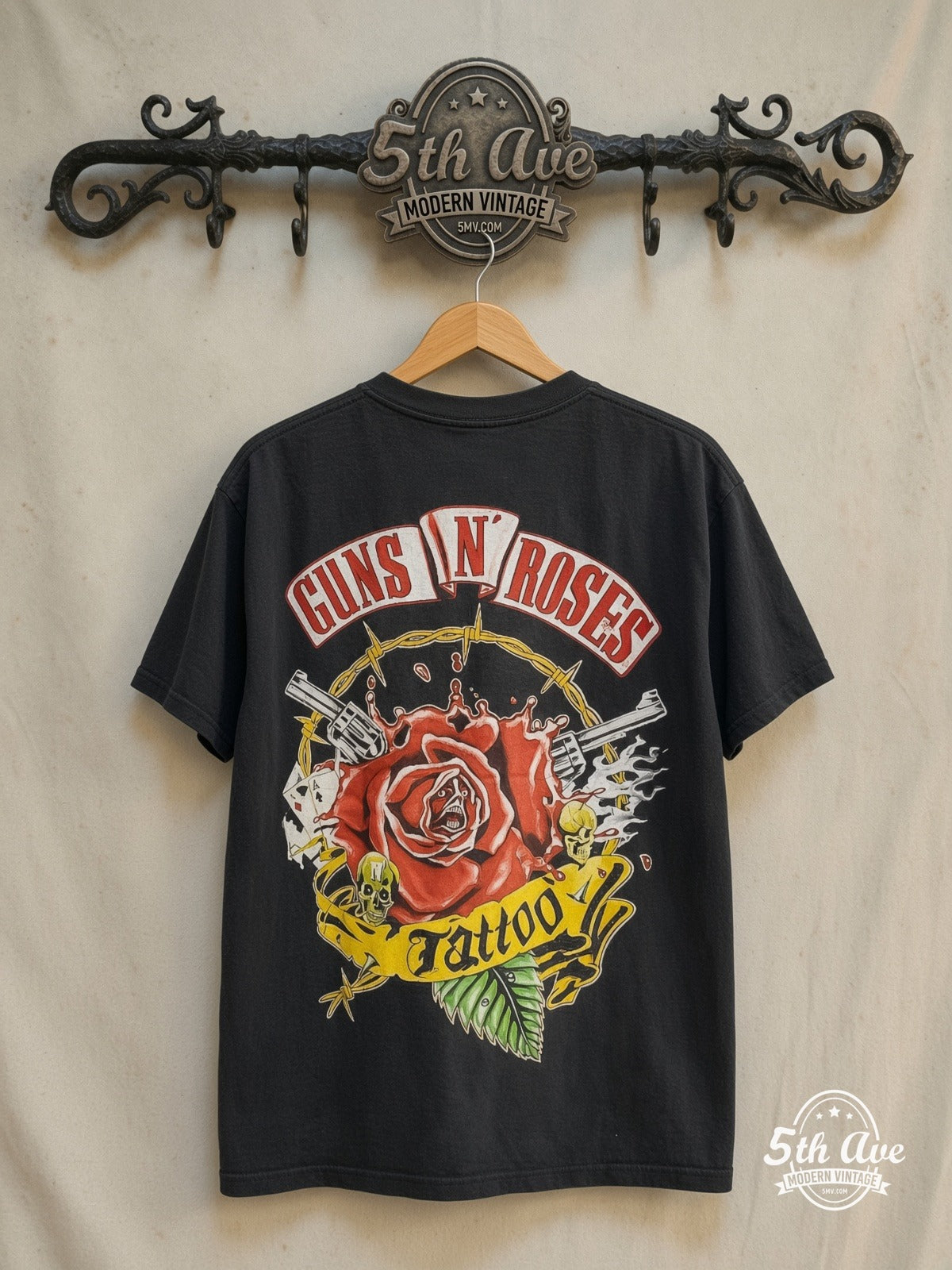 Guns N' Roses – Whiskey – All Over Print – Vintage Band T-Shirt — back on locked cream ornate 5th Ave rack