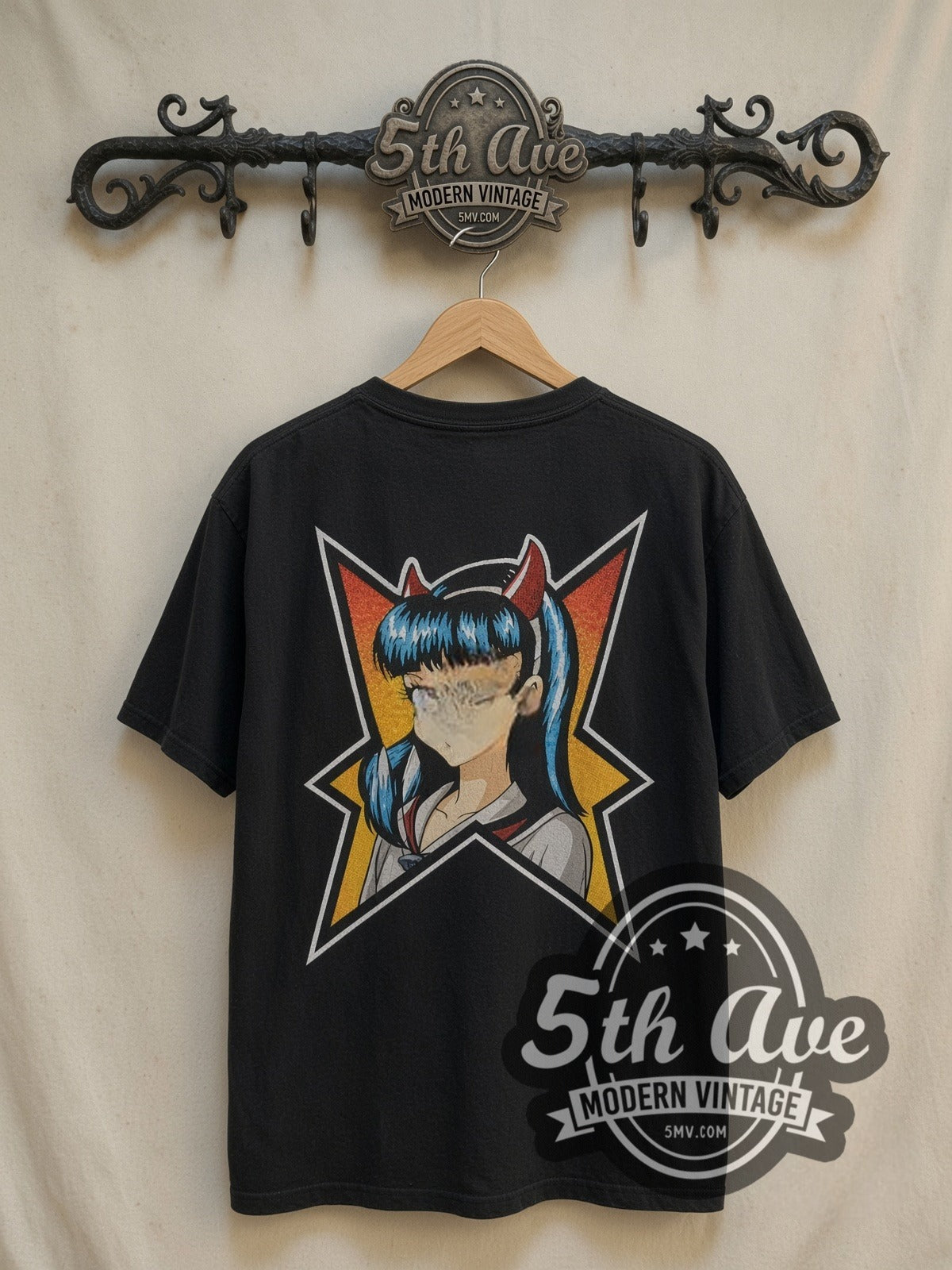 Hook-Ups Devil Girl graphic tee in black, back view on a display rack