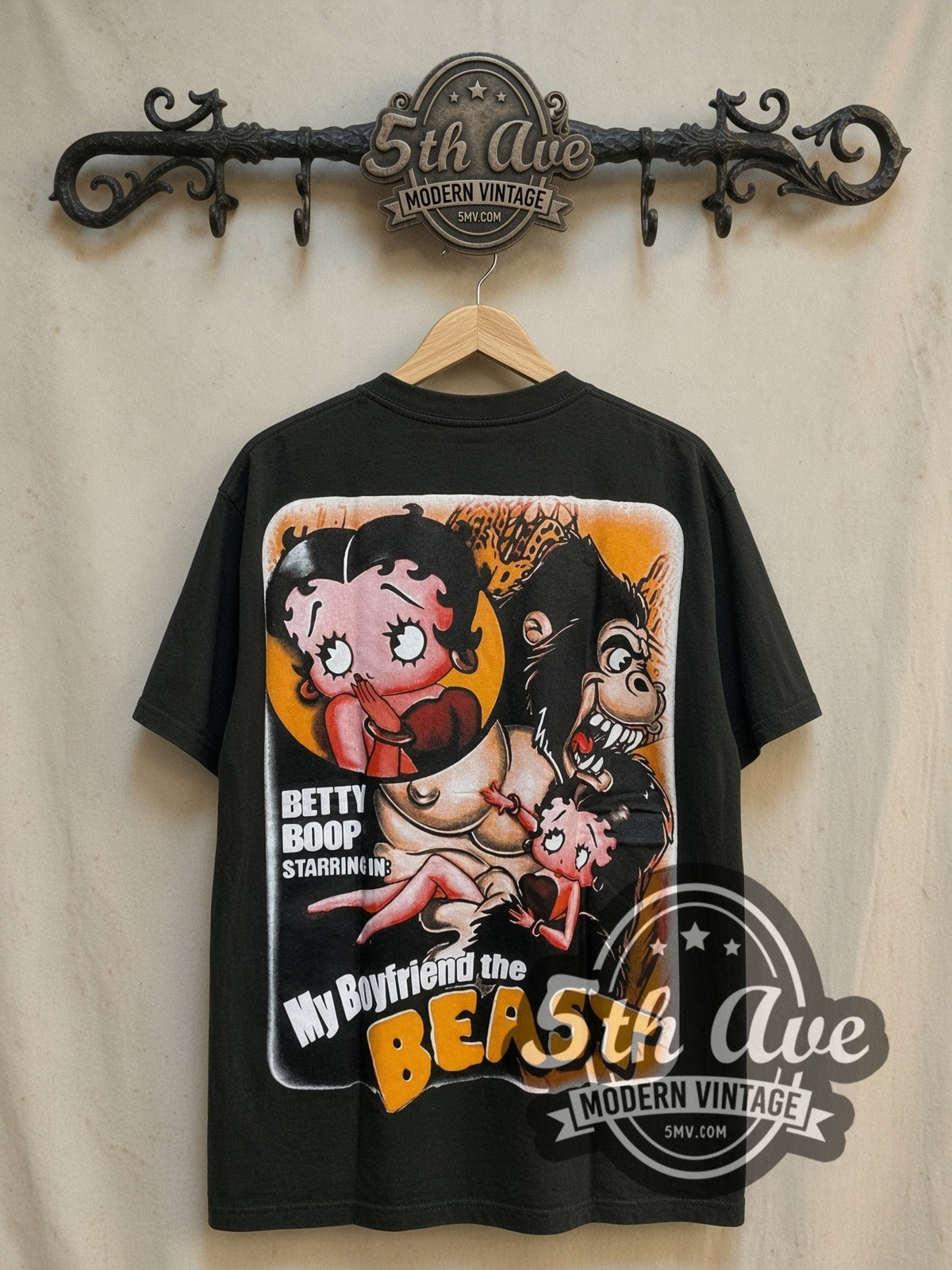 Betty Boop Betty and the Beast vintage cartoon tee, back view on a display rack