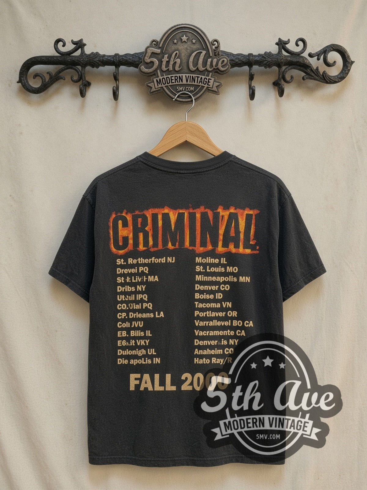 Eminem Criminal Tour 2000 vintage band t-shirt, back view on a display rack