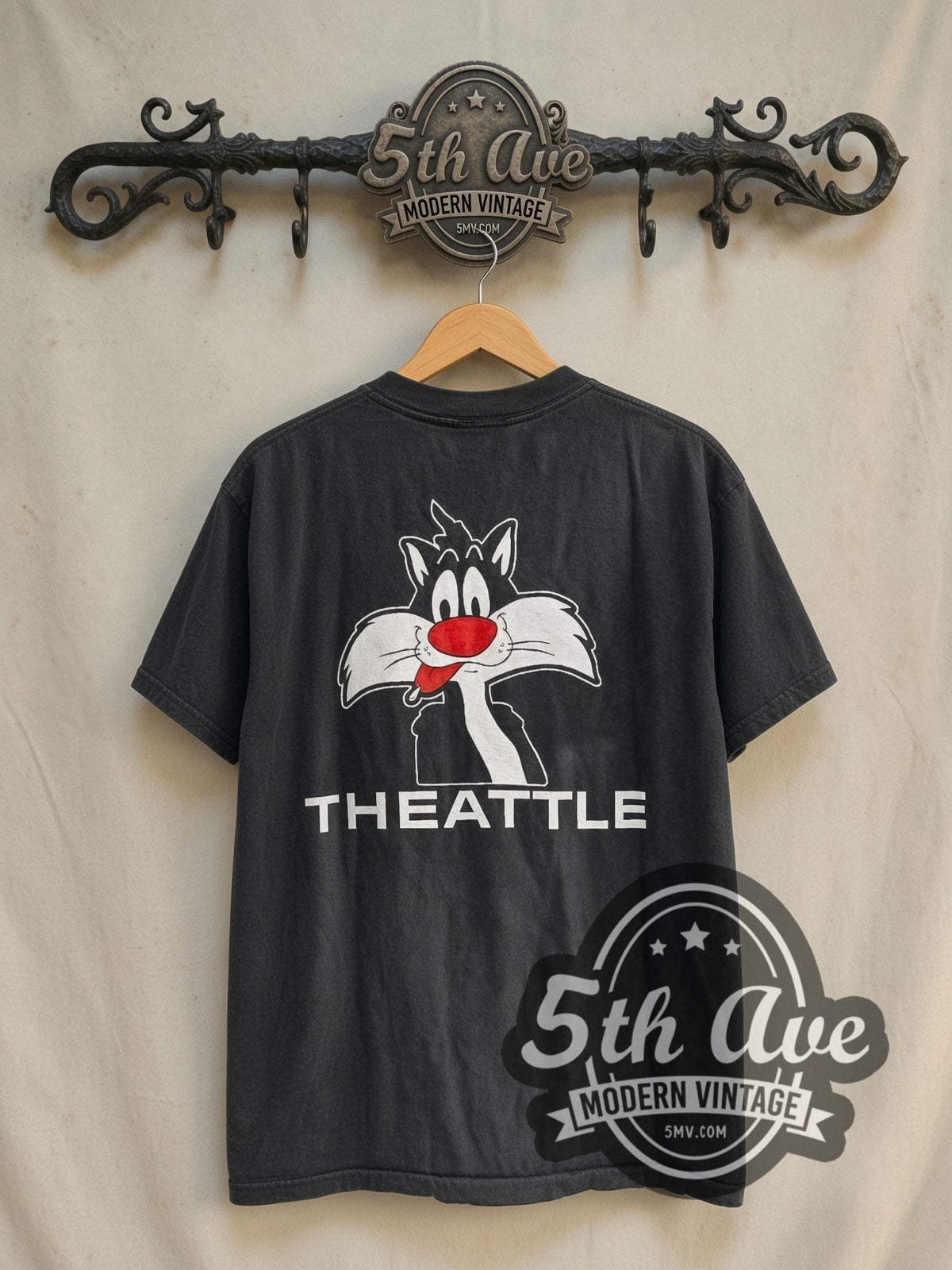 Looney Tunes Sylvester No Fur vintage cartoon tee in black, back view on a display rack