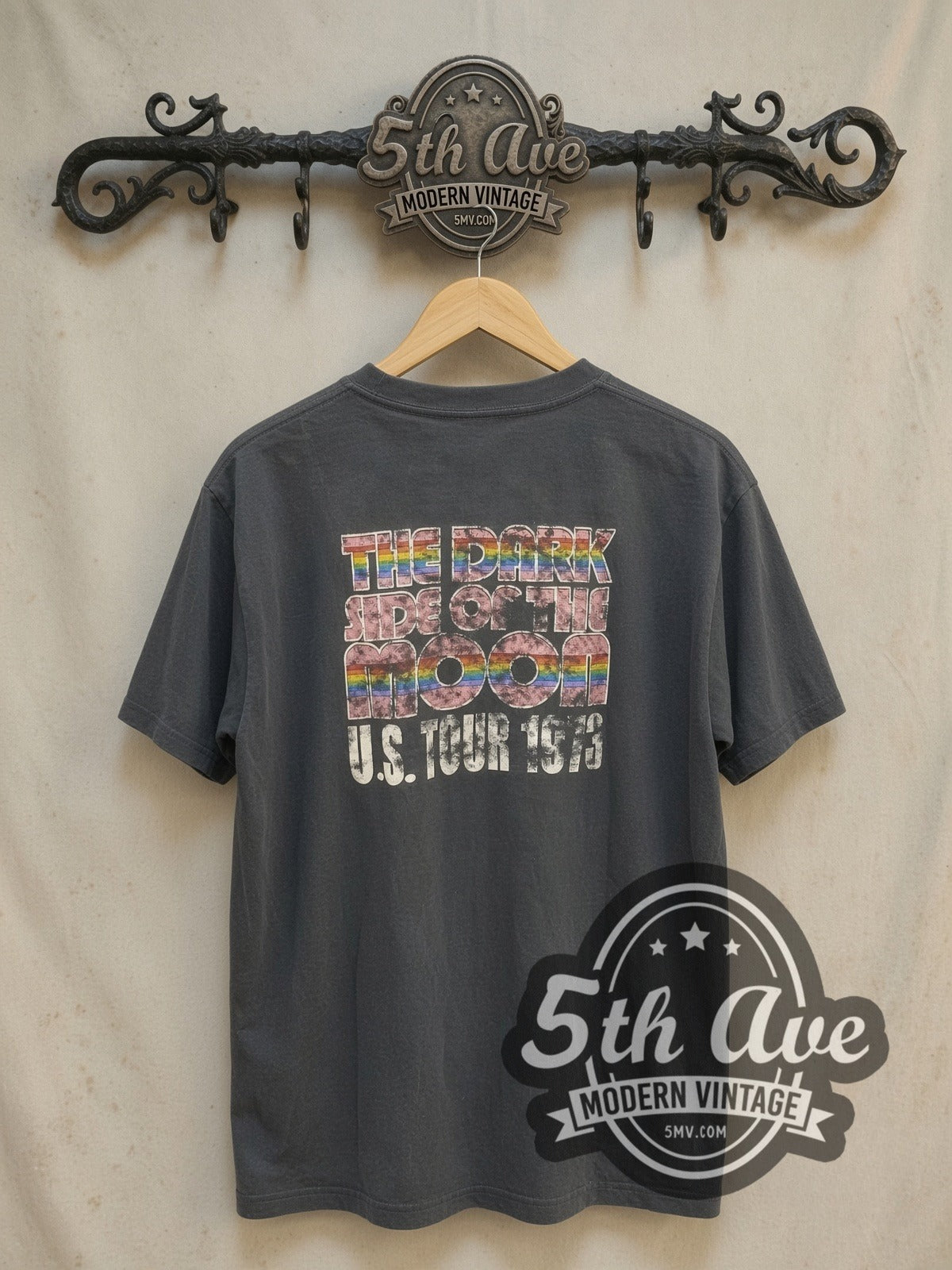 Pink Floyd Dark Side of the Moon Prism vintage band t-shirt, back view on a display rack