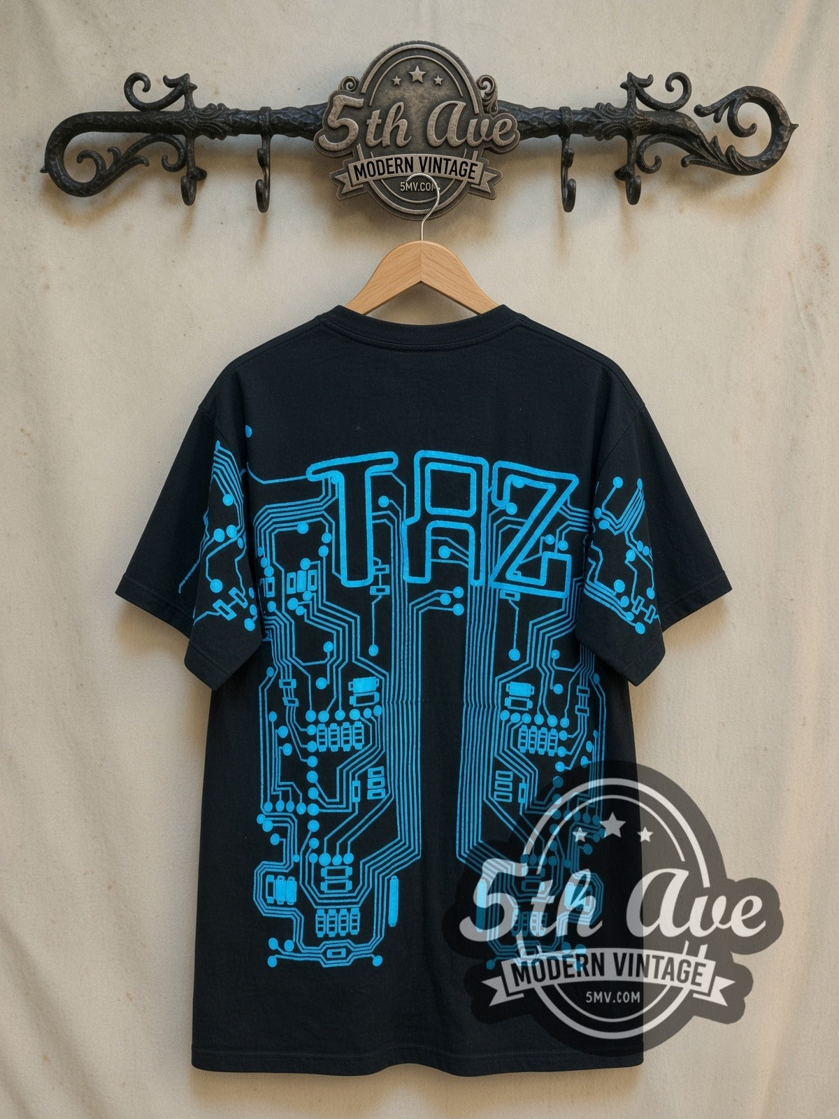 Looney Tunes Taz-Mania Hi-Tech Taz all-over-print vintage cartoon tee, back view on a display rack