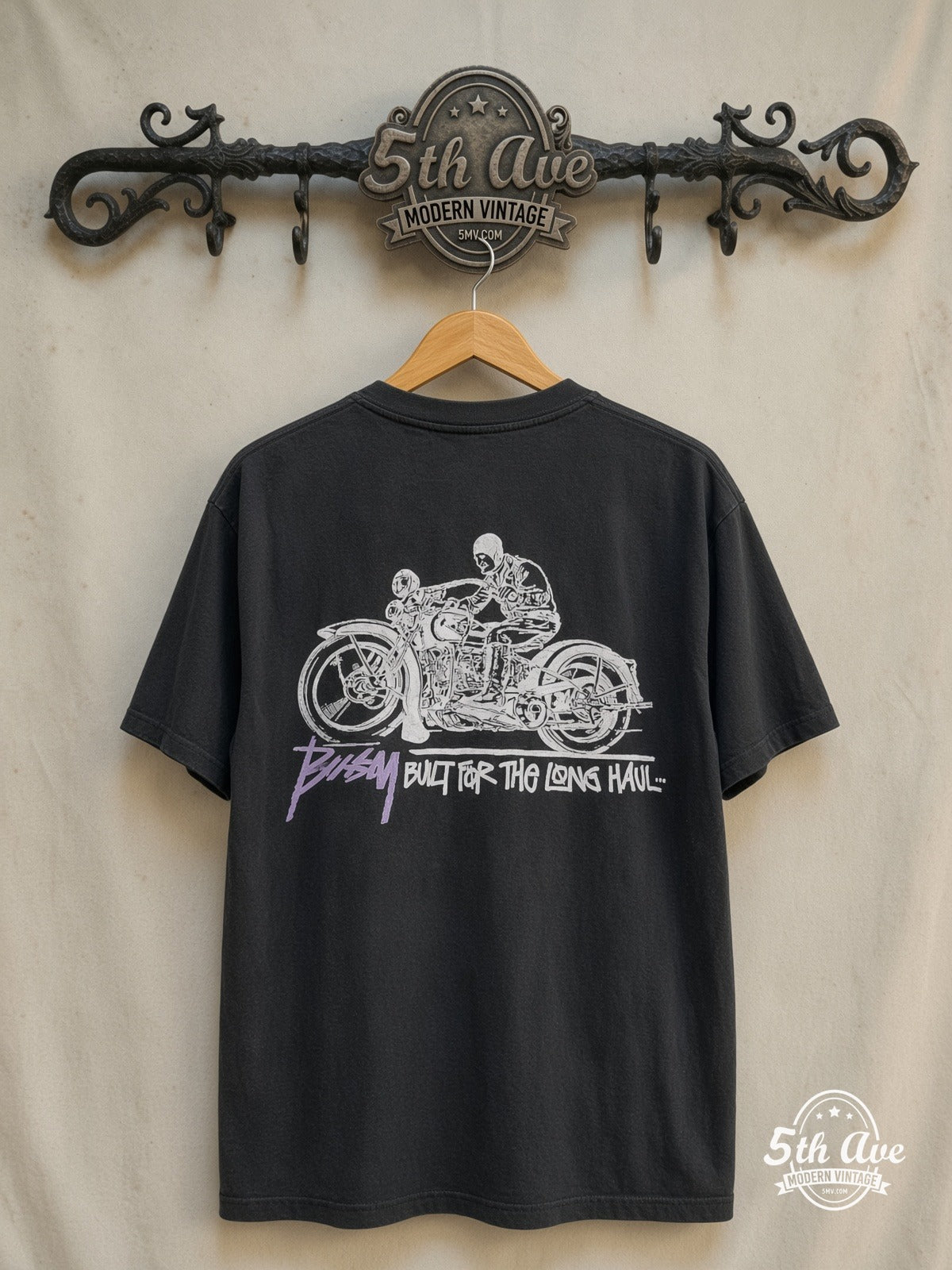 Stussy – Built for the Long Haul – Vintage Graphic Tee — back on locked cream ornate 5th Ave rack