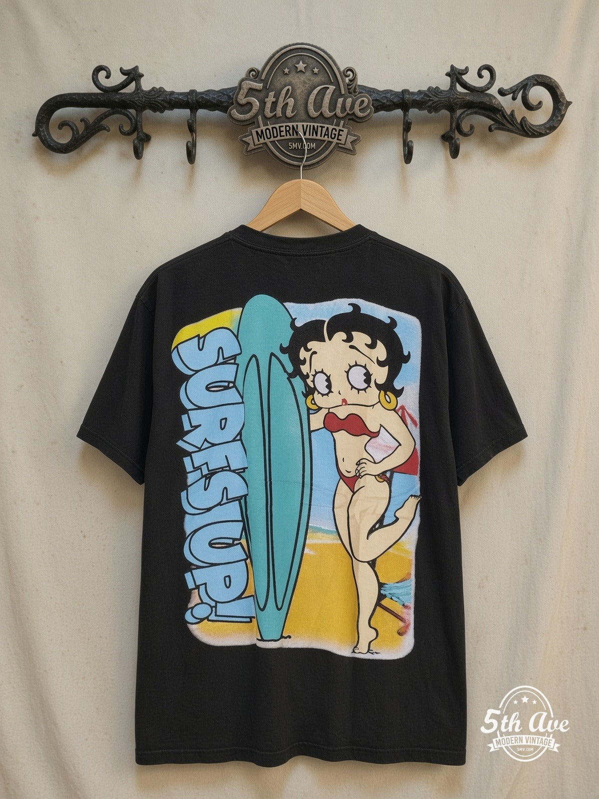 Betty Boop Boop Surf and Surf's Up Back vintage cartoon tee, back view on a display rack