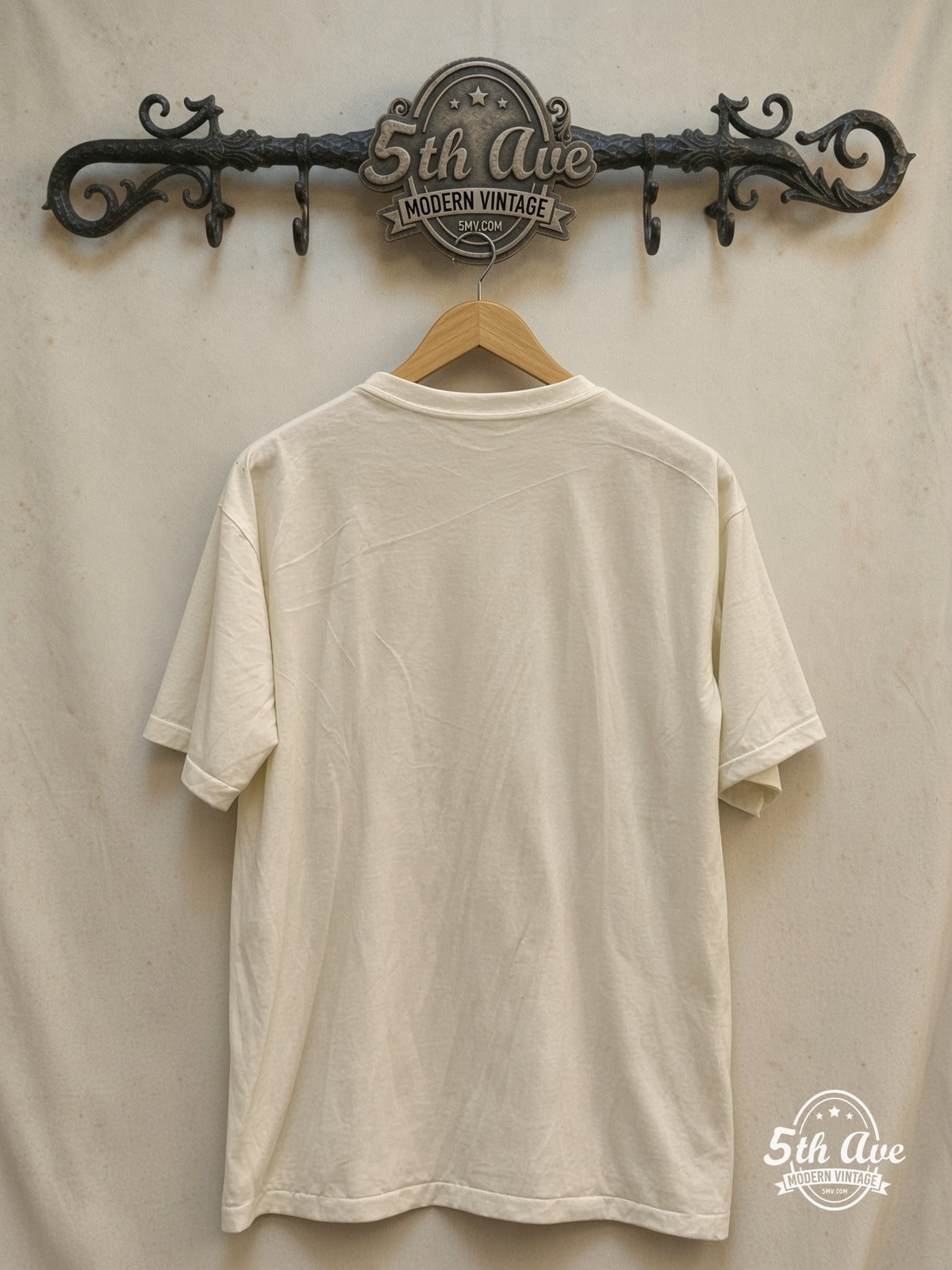 Elton John – 1974 Tour Concert – Vintage Band T-Shirt — back on locked cream ornate 5th Ave rack