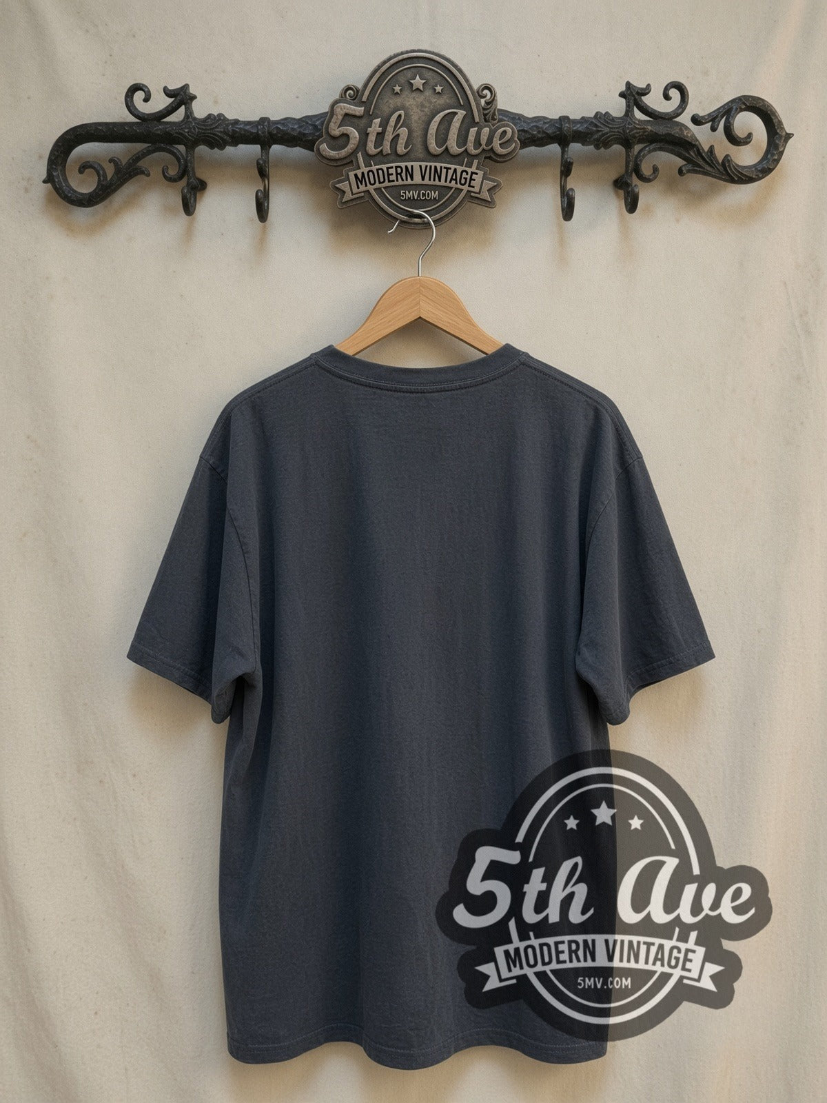New Order Vibrant Collage vintage band t-shirt, back view on a display rack