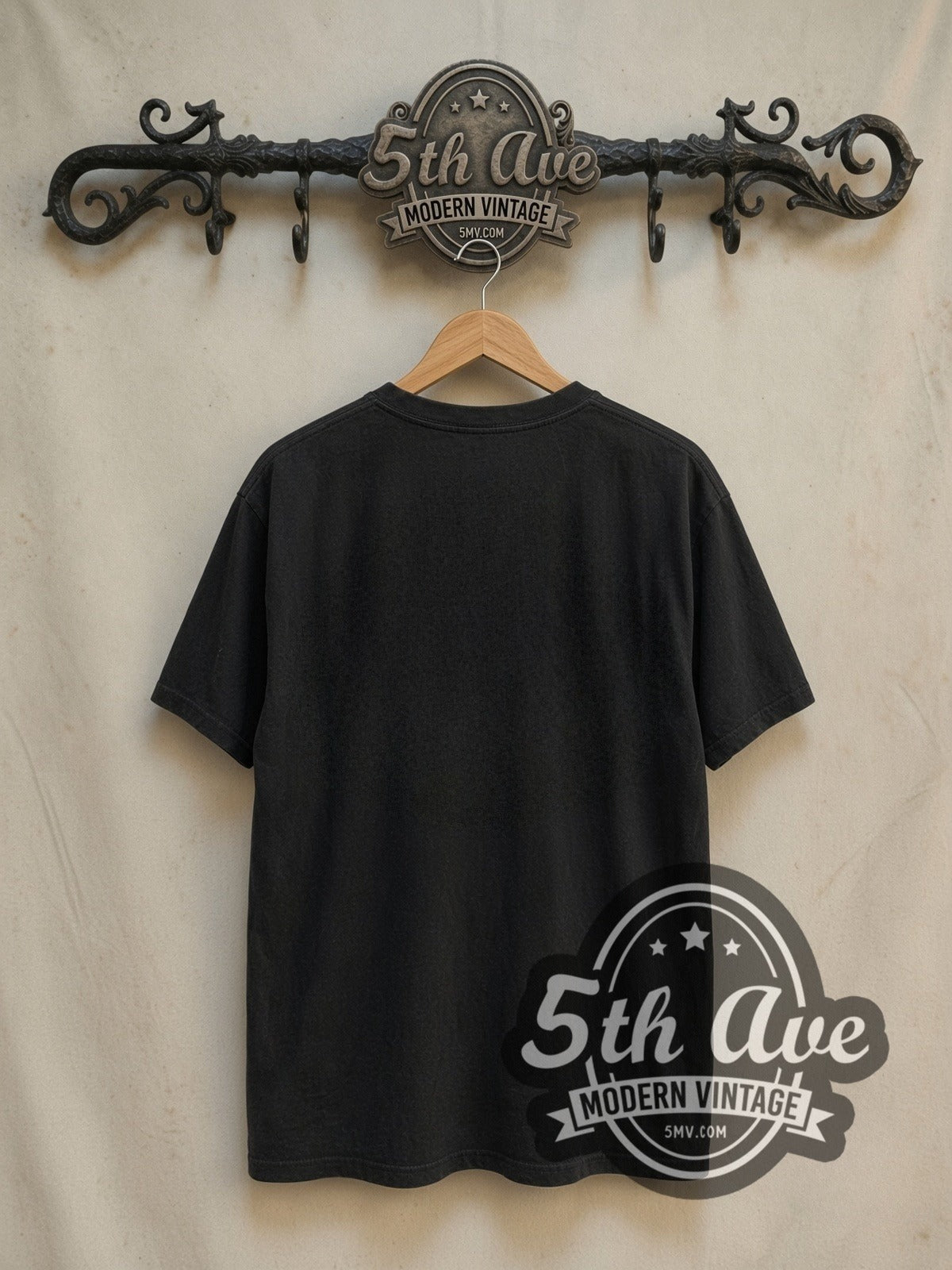 Bruce Lee Enter the Legend vintage movie t-shirt, back view on a display rack