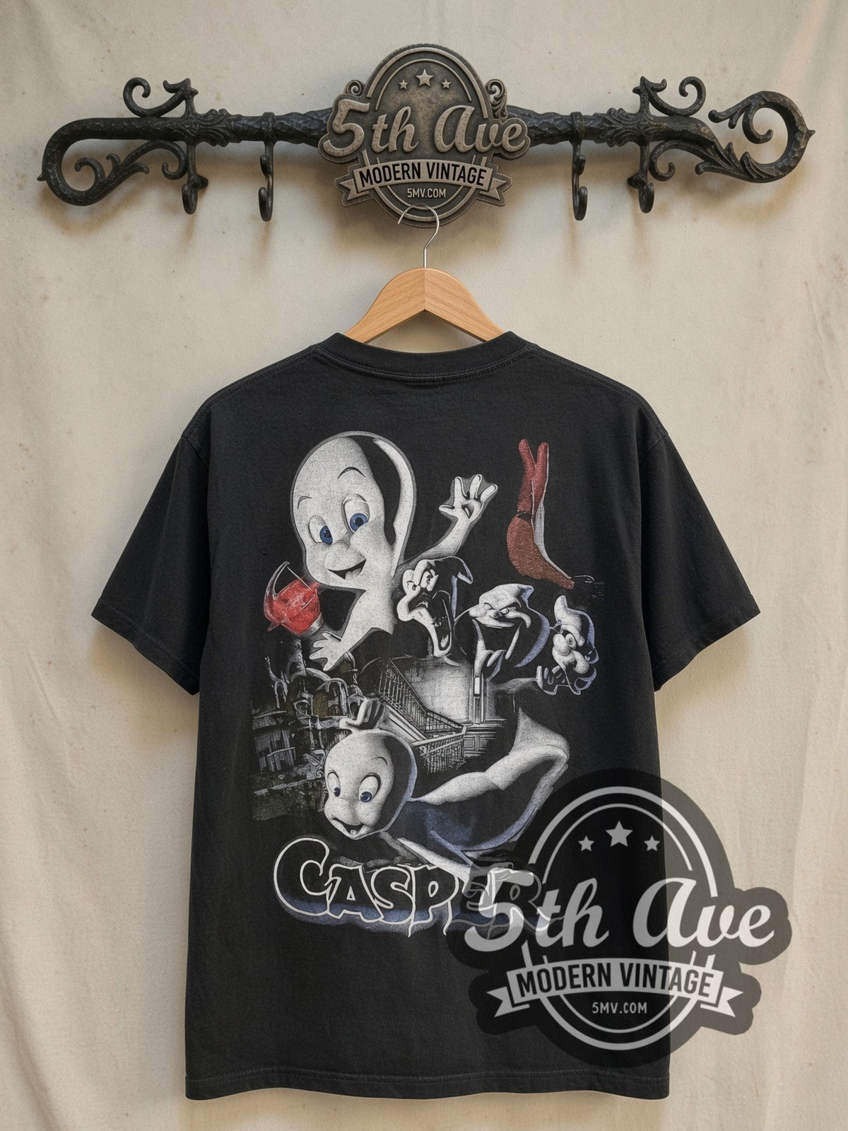 Casper The Movie 1995 vintage graphic t-shirt, back view on a display rack