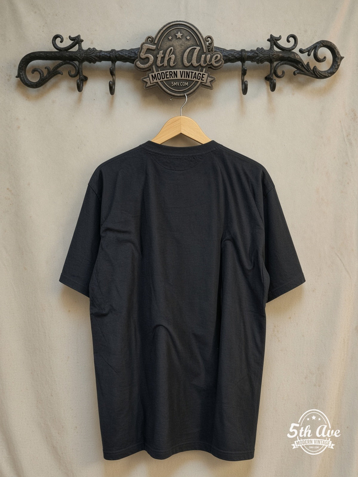 Disturbed Monstrous Resonance t shirt – Vintage Band T-Shirt — back on locked cream ornate 5th Ave rack
