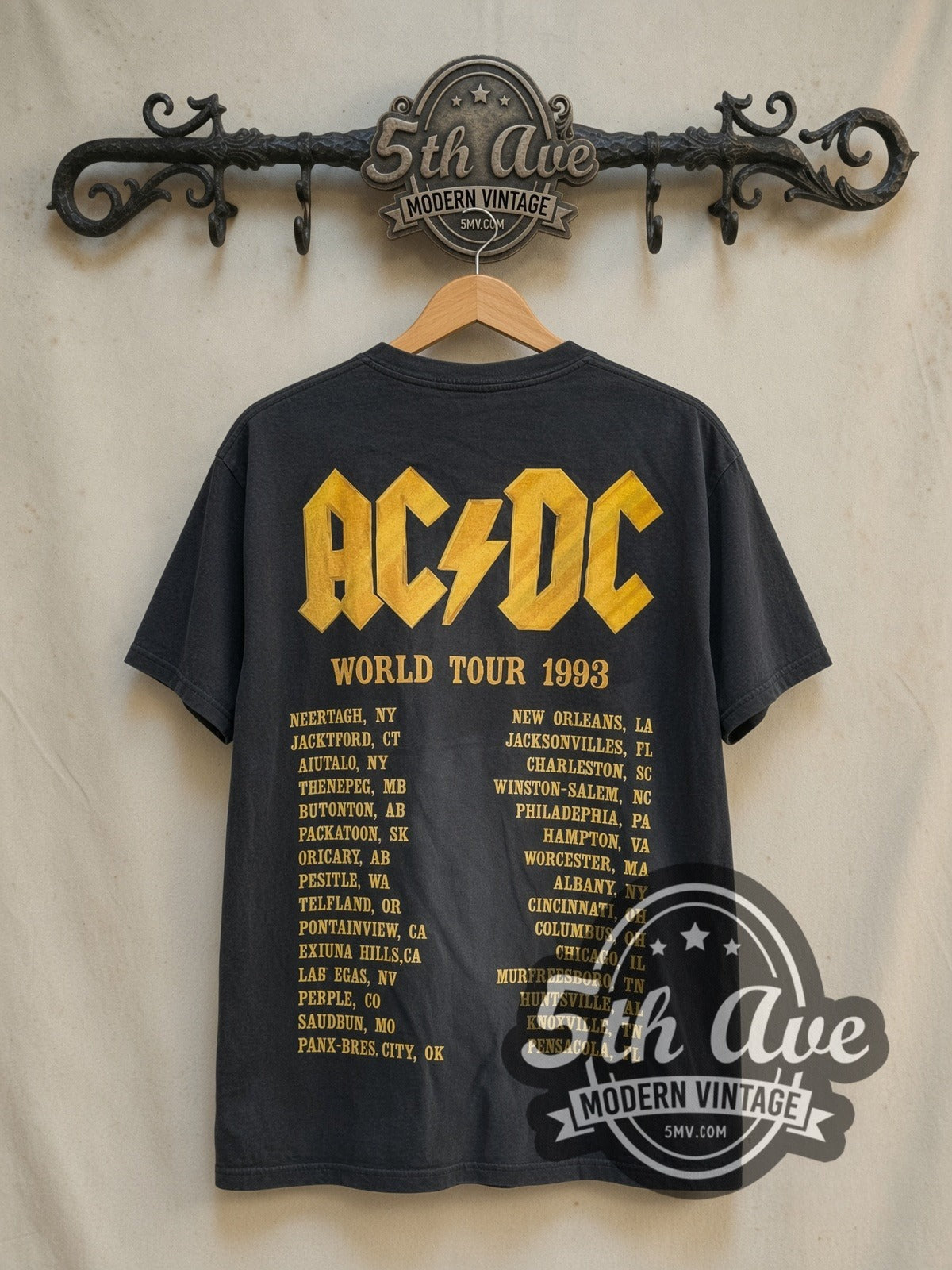 AC/DC Givin the Dog a Bone World Tour 1993 vintage band t-shirt in black, back view on a display rack