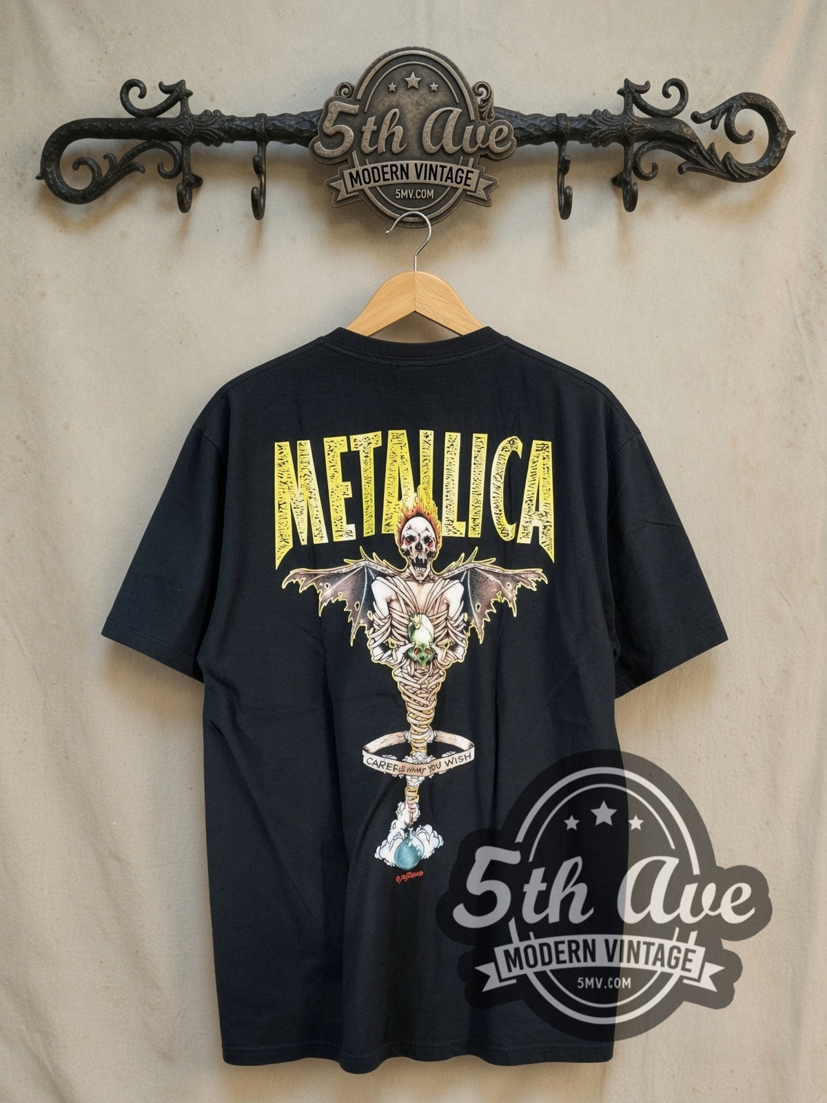 Metallica King Nothing Fanged Skull Blue Star vintage band t-shirt, back view on the 5MV rack