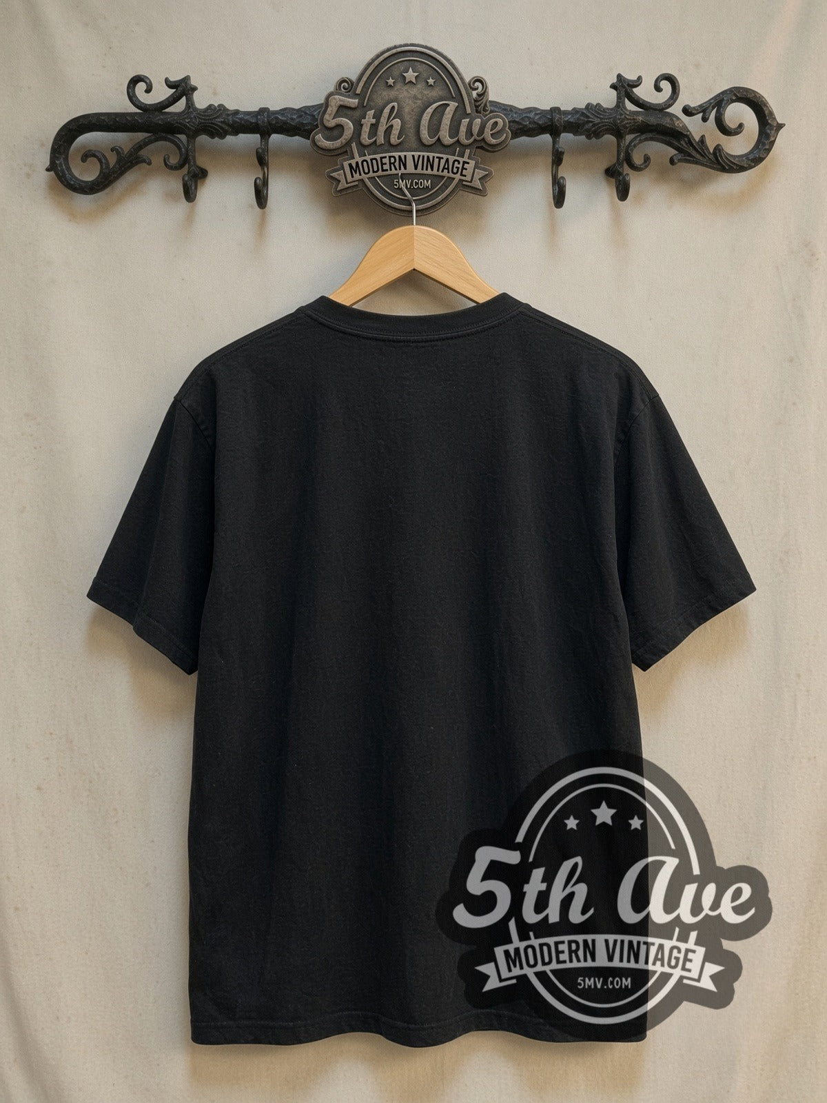 Led Zeppelin White Zeppelin Airship Logo vintage band t-shirt in black, back view on a display rack
