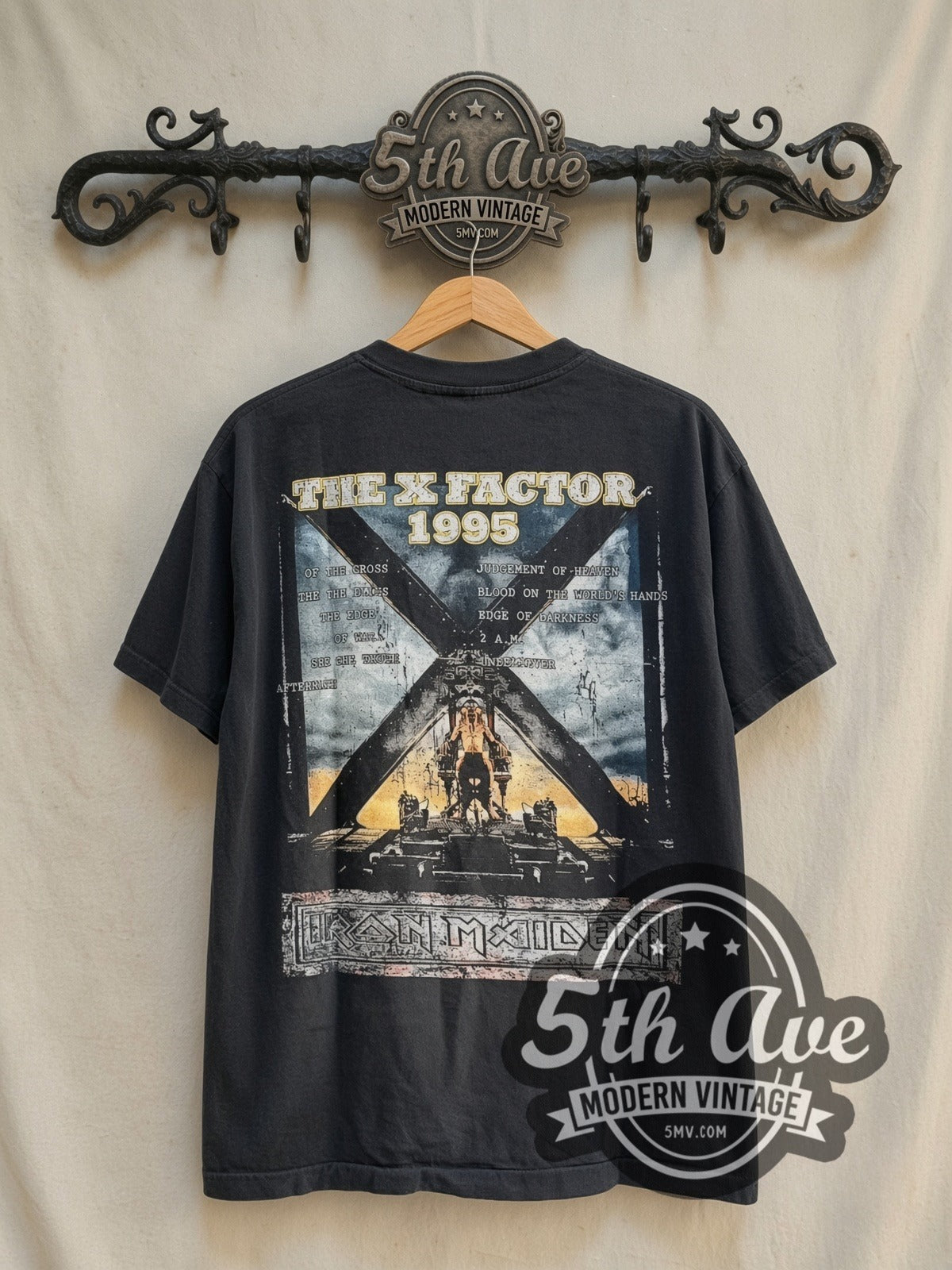 Iron Maiden The X Factor Tour' 1995 vintage band t-shirt in black, back view on a display rack