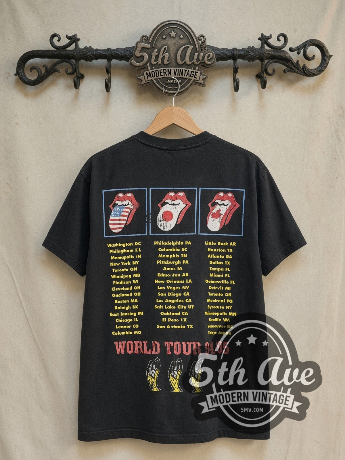 The Rolling Stones World Tour 1994/1995 vintage band t-shirt in black, back view on a display rack