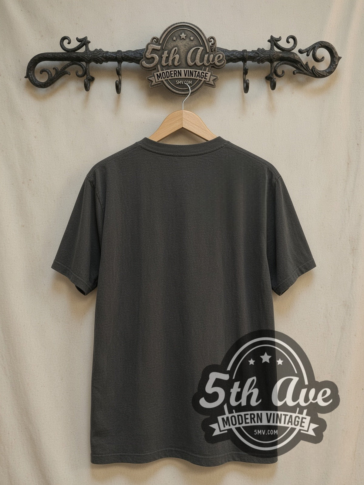 Michael Schenker Group Guitar Logo vintage band t-shirt, back view on a display rack