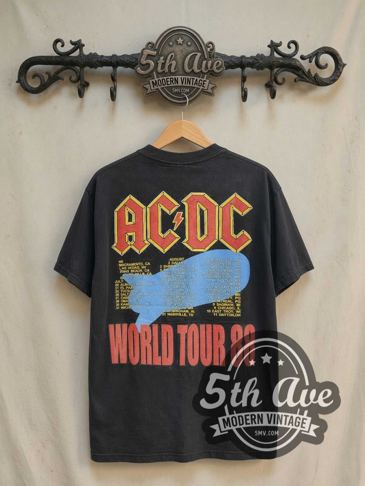 AC/DC Blow Up Your Video TV Burst City List vintage band t-shirt in black, back view on a display rack