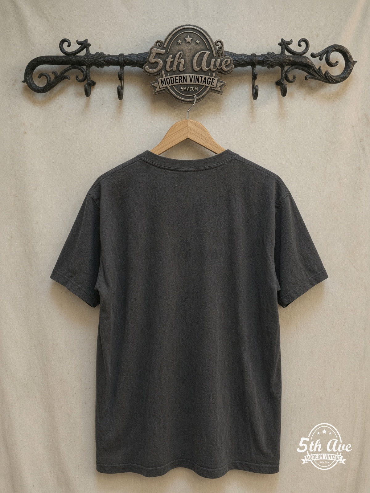 Judas Priest – Point of Entry' Electric Guitar – Vintage Band T-Shirt — back on locked cream ornate 5th Ave rack