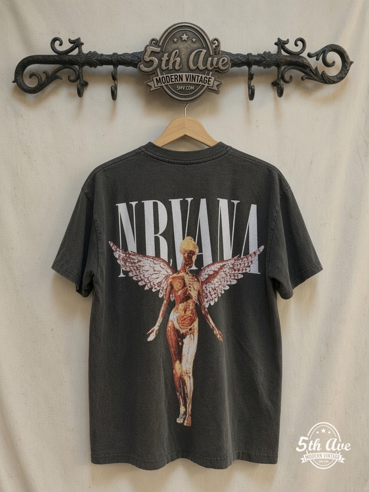 Nirvana – In Utero Bootleg – Vintage Band T-Shirt — back on locked cream ornate 5th Ave rack