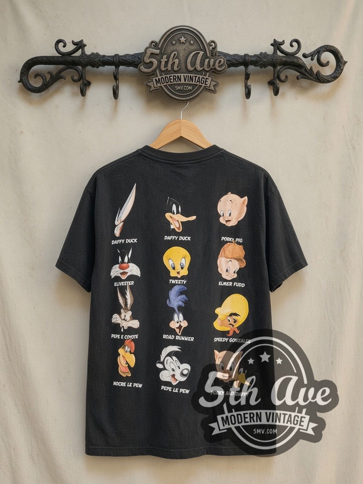 Looney Tunes Bugs Bunny and Friends vintage cartoon tee in black, back view on a display rack