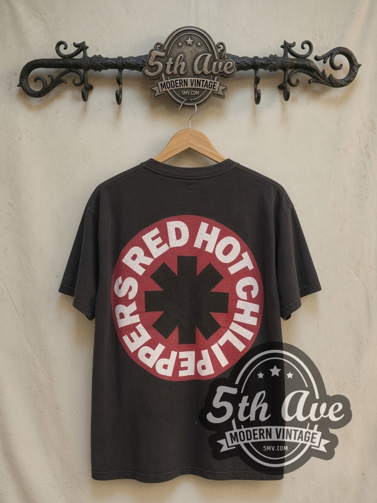 Red Hot Chili Peppers Psychedelic Swirl vintage band t-shirt, back view on a display rack