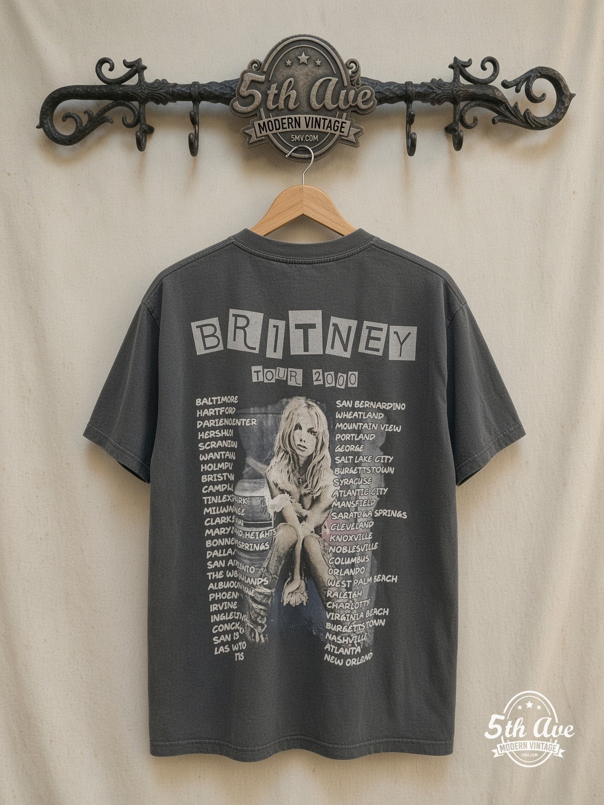 Britney Spears – Oops!... I Did It Again Tour 2000 – Vintage Band T-Shirt — back on locked cream ornate 5th Ave rack