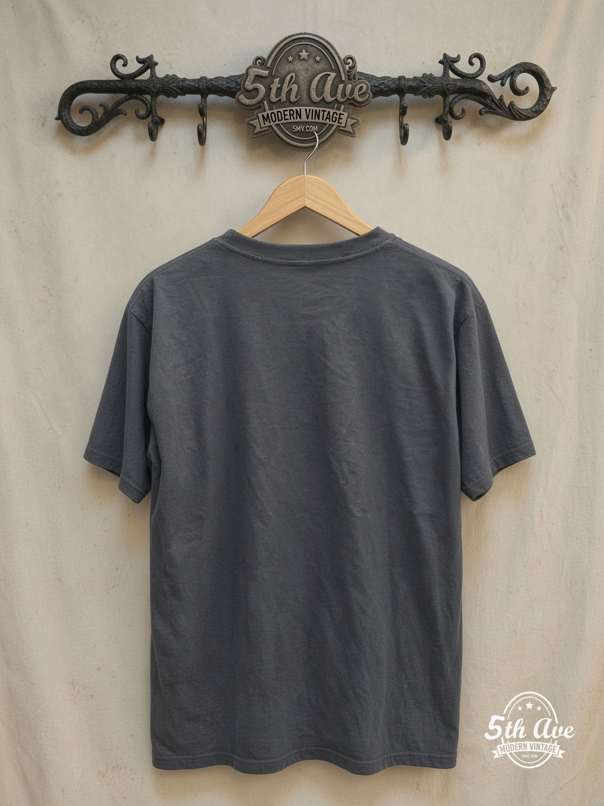 Queen – Live at Wembley Stadium – Vintage Band T-Shirt — back on locked cream ornate 5th Ave rack