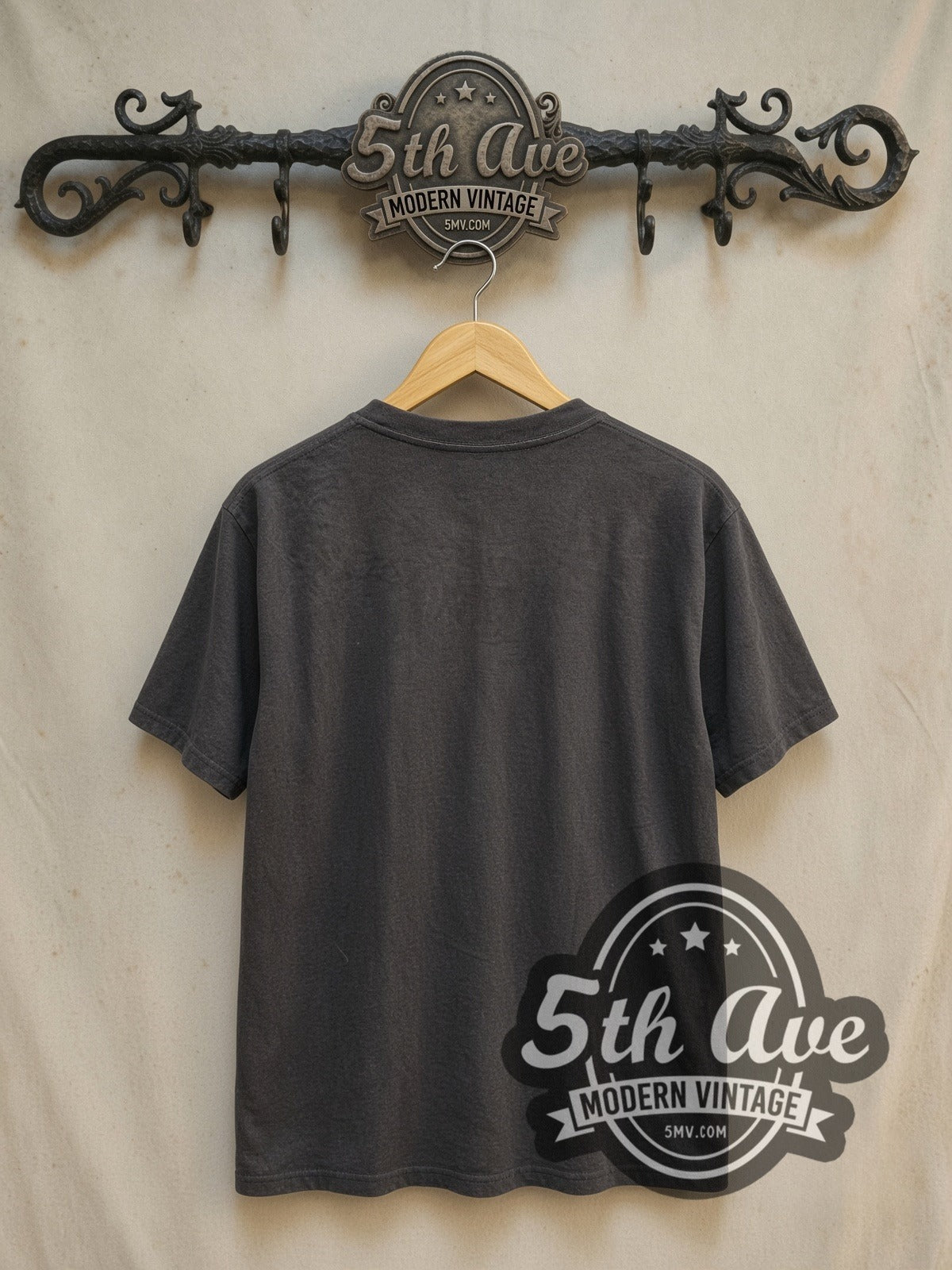 Queen Not Save The Queen Punk Parody vintage band t-shirt, back view on a display rack