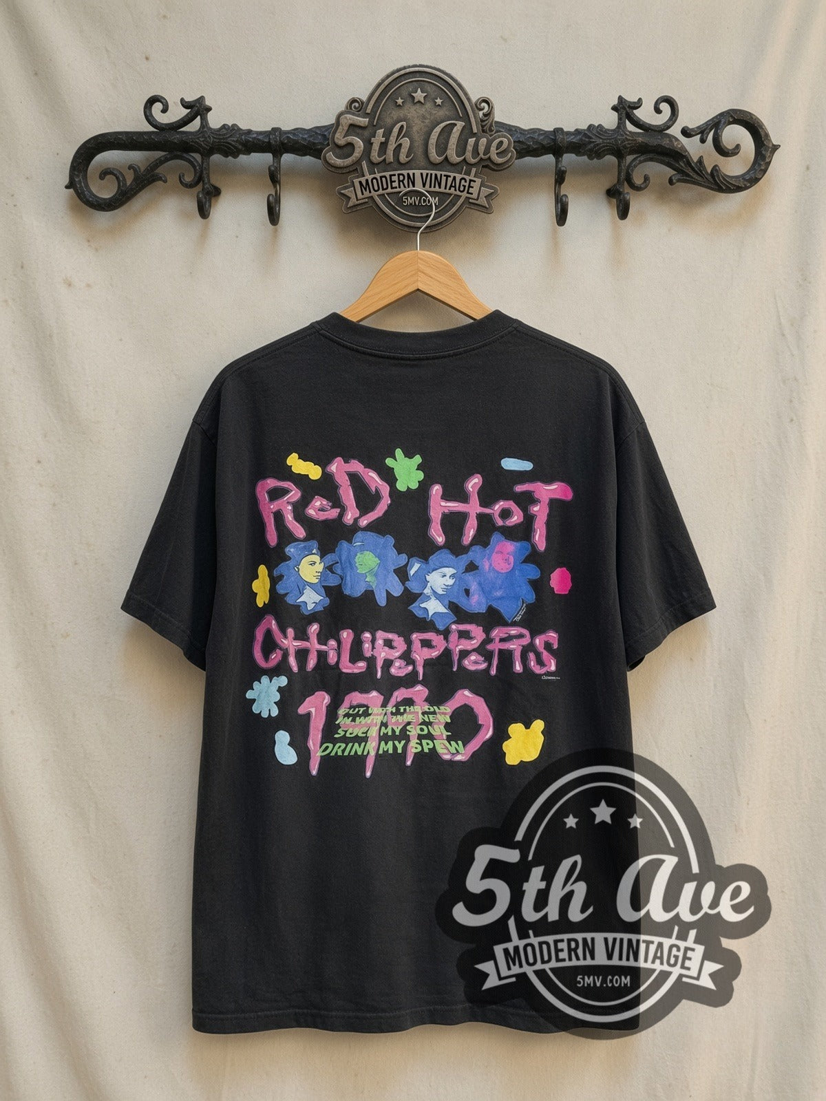 Red Hot Chili Peppers Out With the Old vintage band t-shirt in black, back view on a display rack