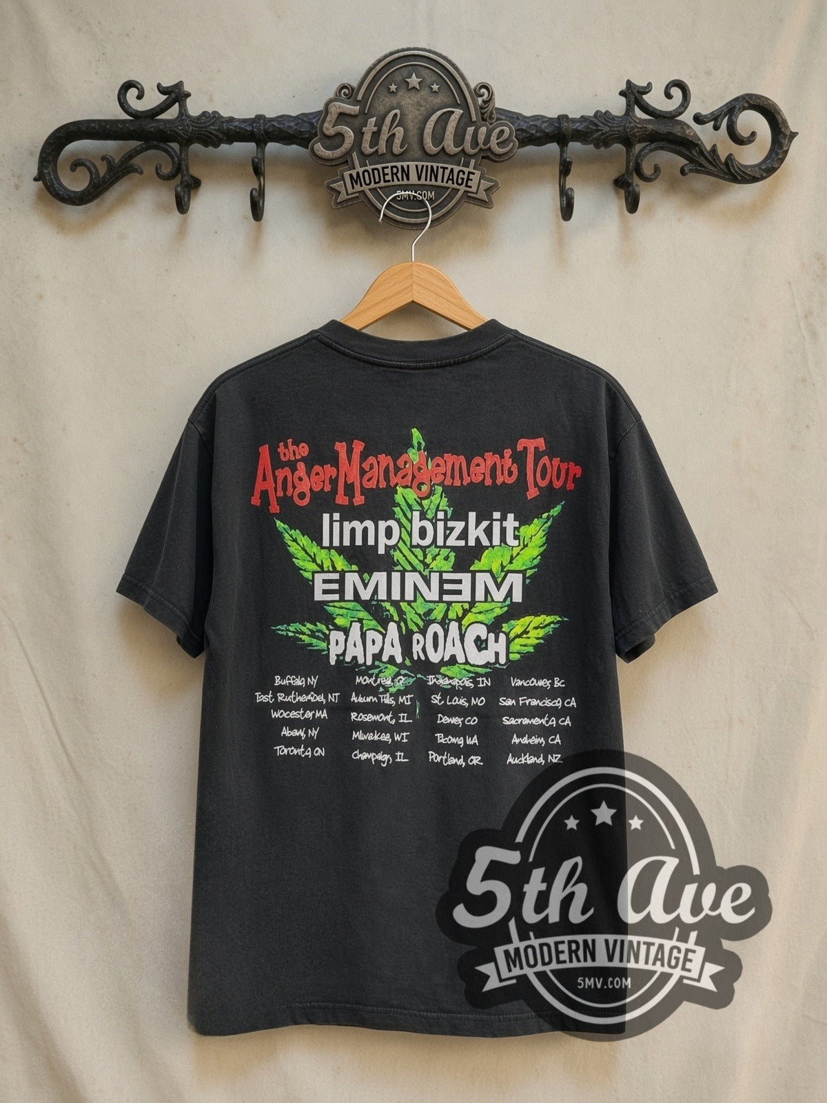 Limp Bizkit Anger Management Green Leaf Eminem Papa Roach vintage band t-shirt in black, back view on a display rack