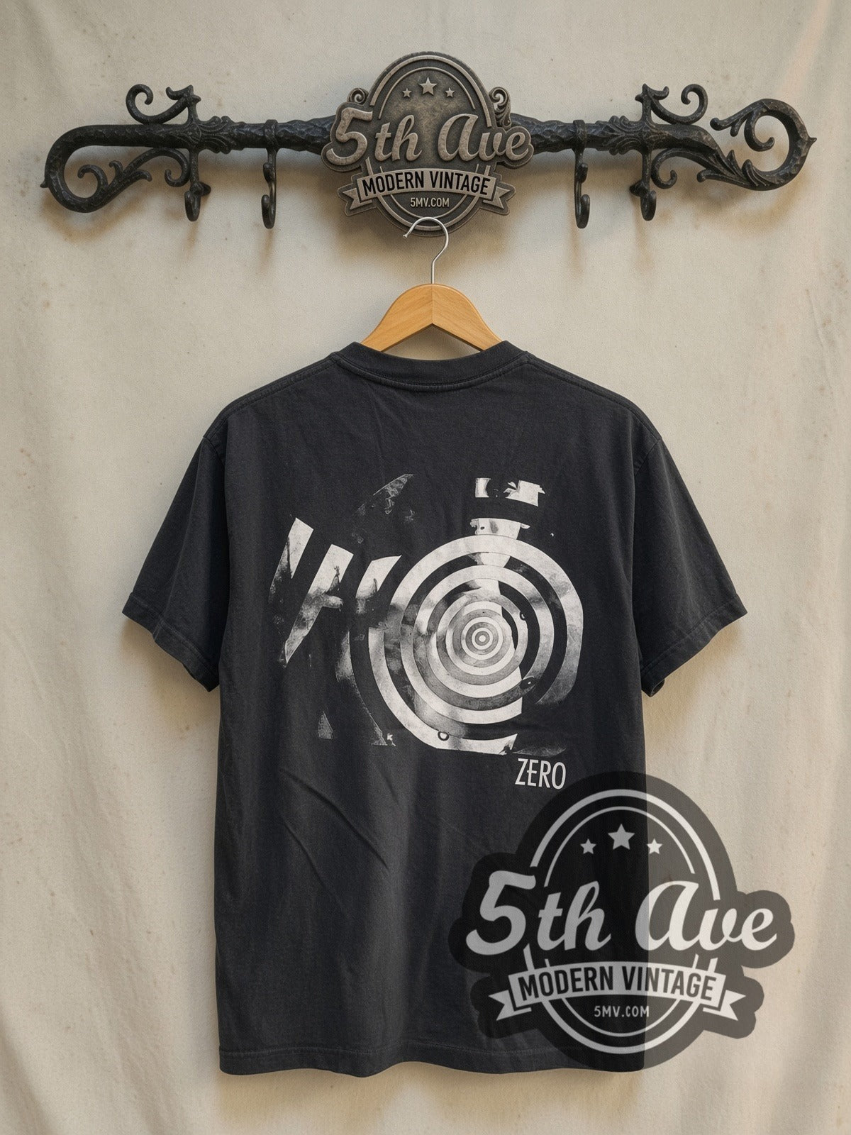 The Smashing Pumpkins Zero Figure Concentric Circle Back vintage band t-shirt in black, back view on a display rack