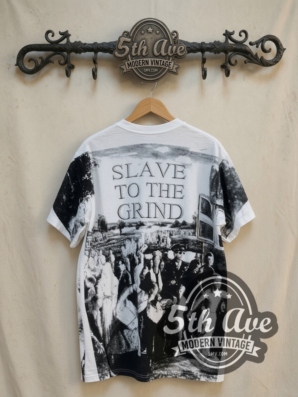 Skid Row Slave to the Grind all-over-print vintage band t-shirt in white, back view on a display rack