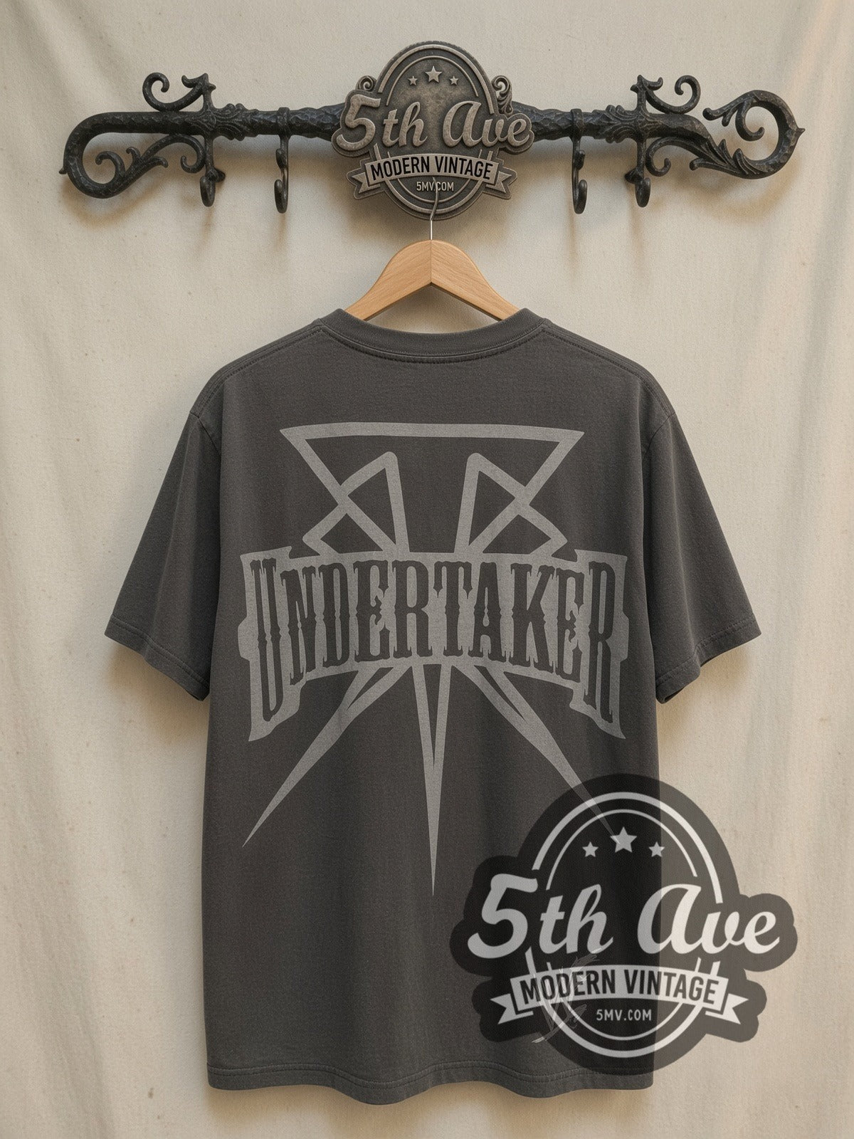 The Undertaker Wrestling Tribute vintage wrestling tee, back view on a display rack