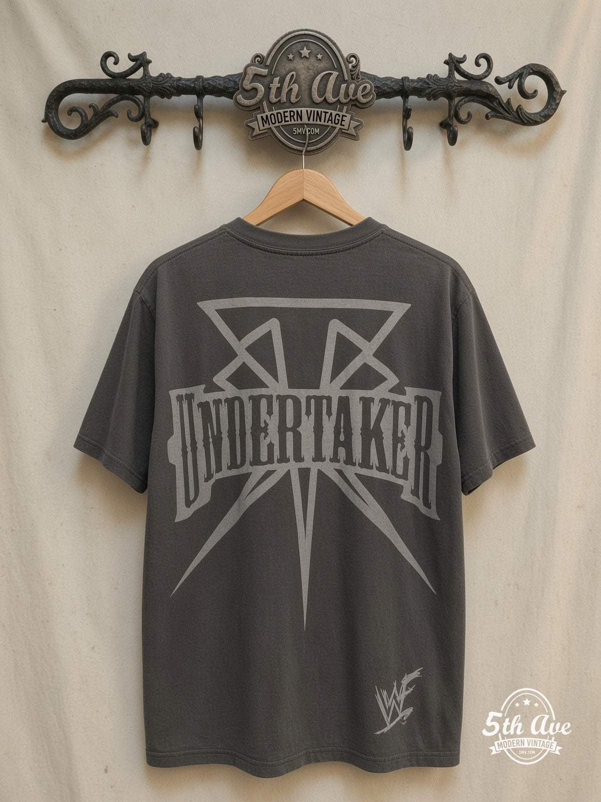 The Undertaker – Wrestling Tribute – Vintage Graphic Tee — back on locked cream ornate 5th Ave rack