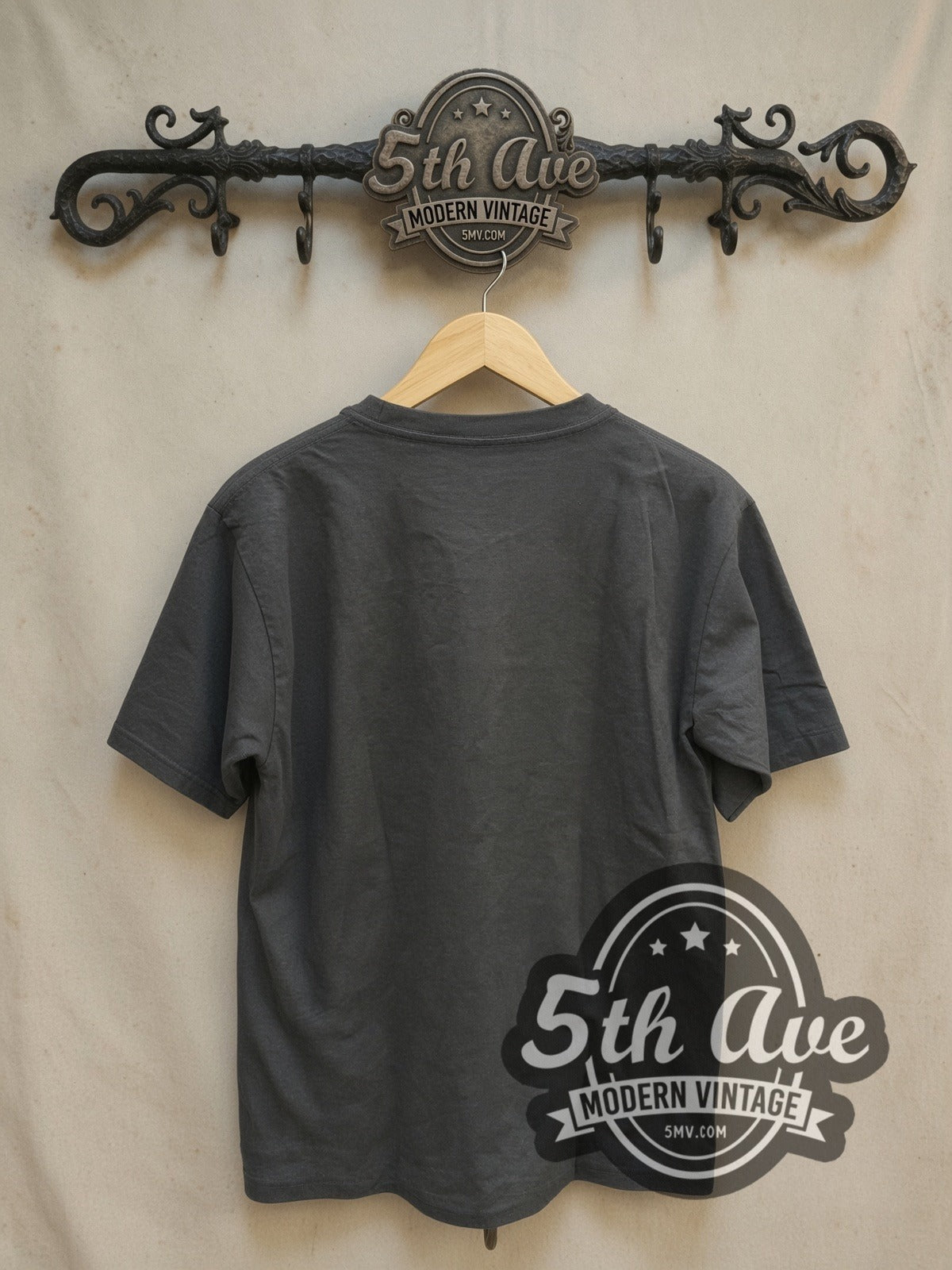 Led Zeppelin 1973 Tour Angel & Zeppelin vintage band t-shirt in black, back view on a display rack