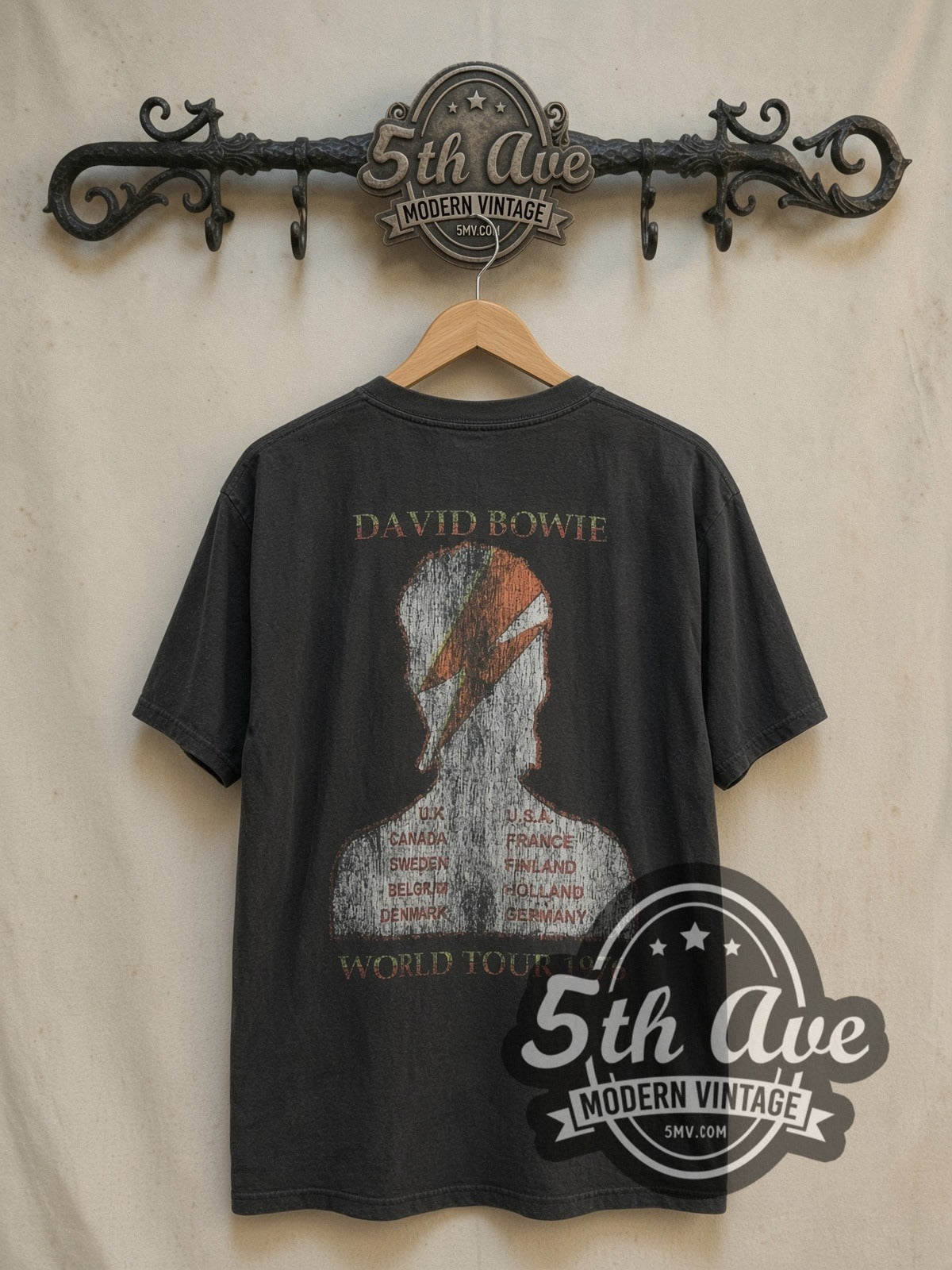David Bowie 1976 World Tour vintage band t-shirt, back view on a display rack