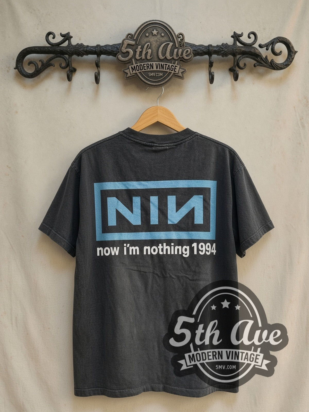 Nine Inch Nails NIИ 'Now I'm Nothing vintage band t-shirt in black, back view on a display rack
