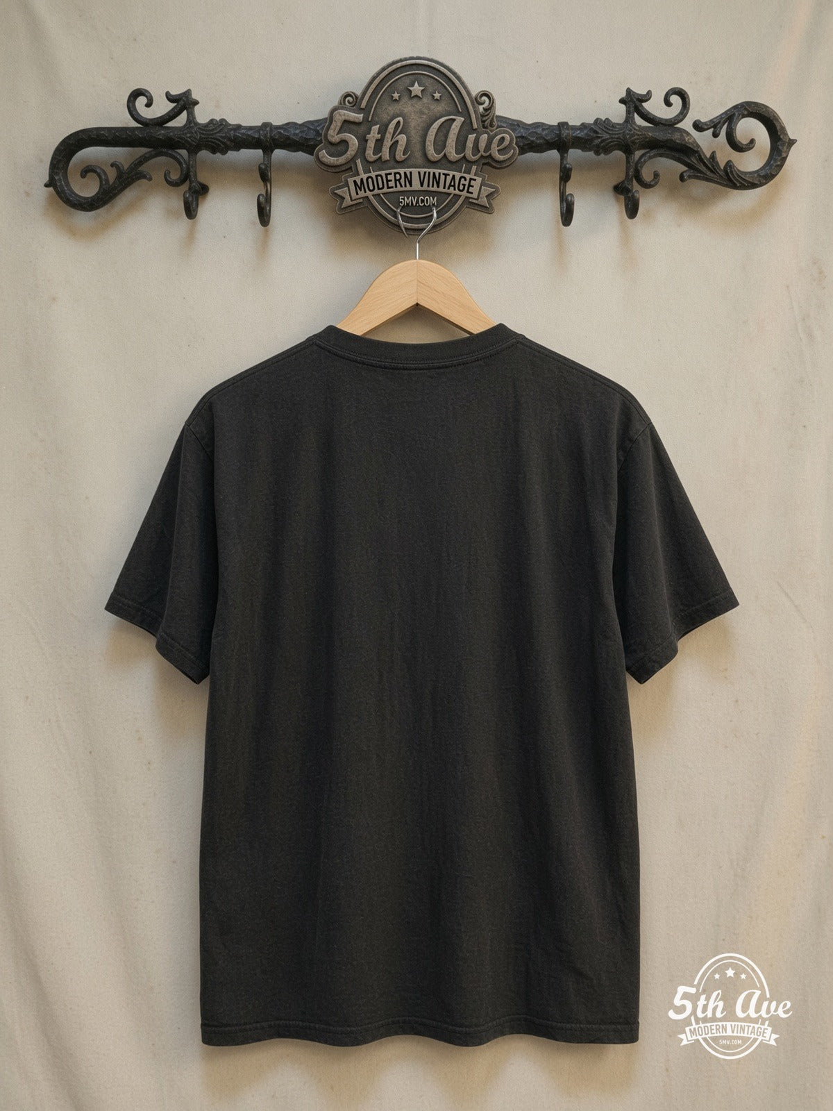 Marilyn Manson – 100% Cotton New Vintage Band T-Shirt – Vintage Band T-Shirt — back on locked cream ornate 5th Ave rack