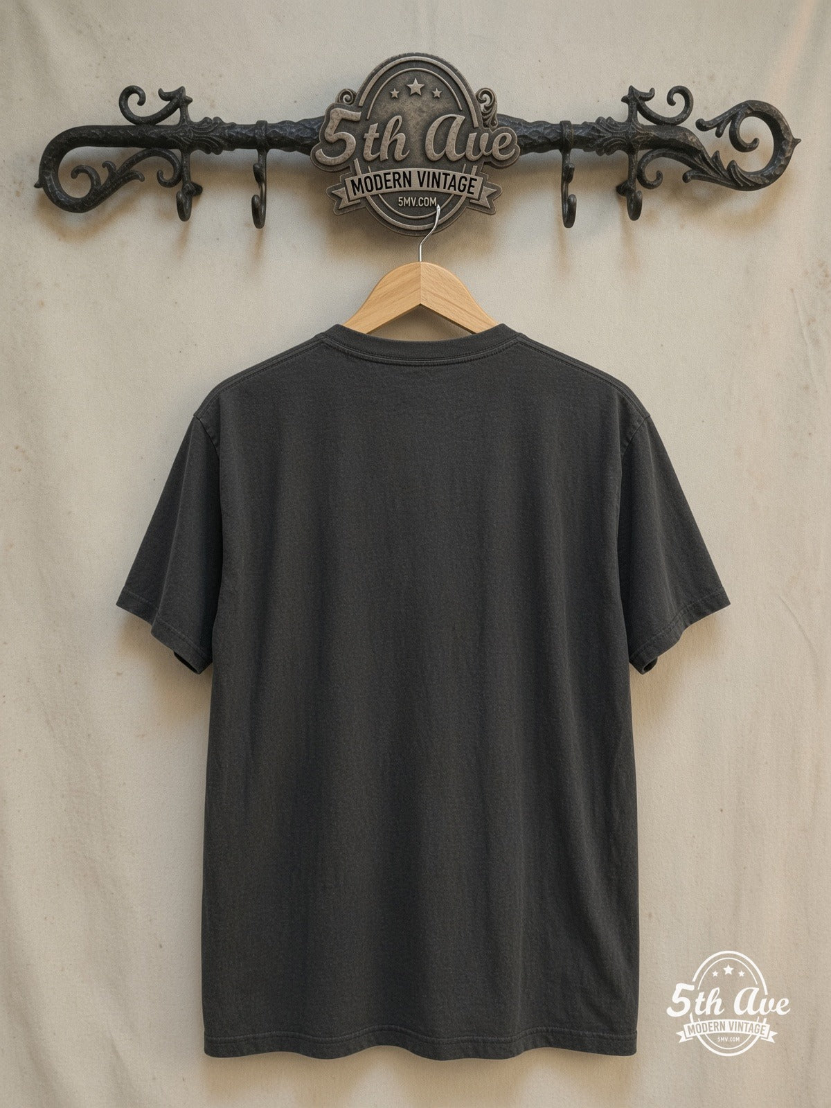 Lynyrd Skynyrd – 1970–1977 Band Image – Vintage Band T-Shirt — back on locked cream ornate 5th Ave rack
