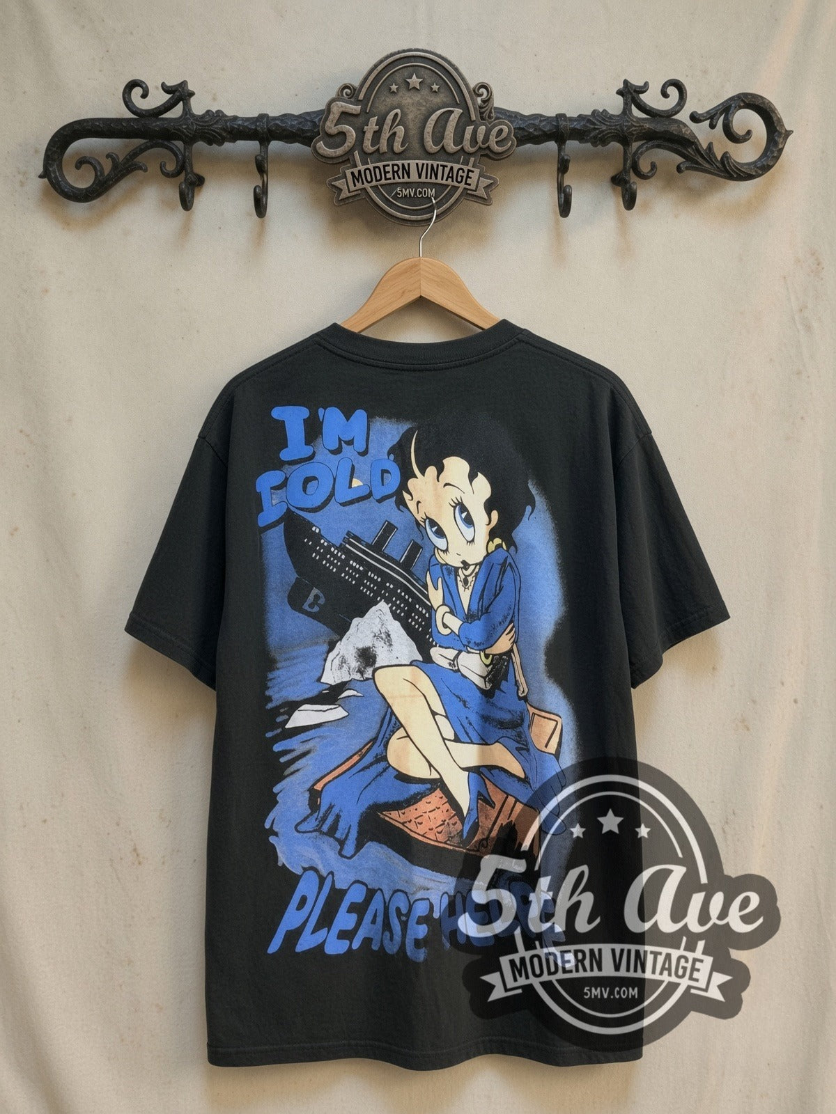 Betty Boop, Popeye and Titanic vintage cartoon tee, back view on a display rack