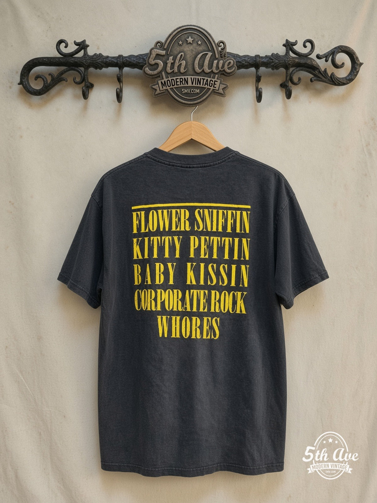 Nirvana – Smiley Face Corporate Rock Whores – Vintage Band T-Shirt — back on locked cream ornate 5th Ave rack