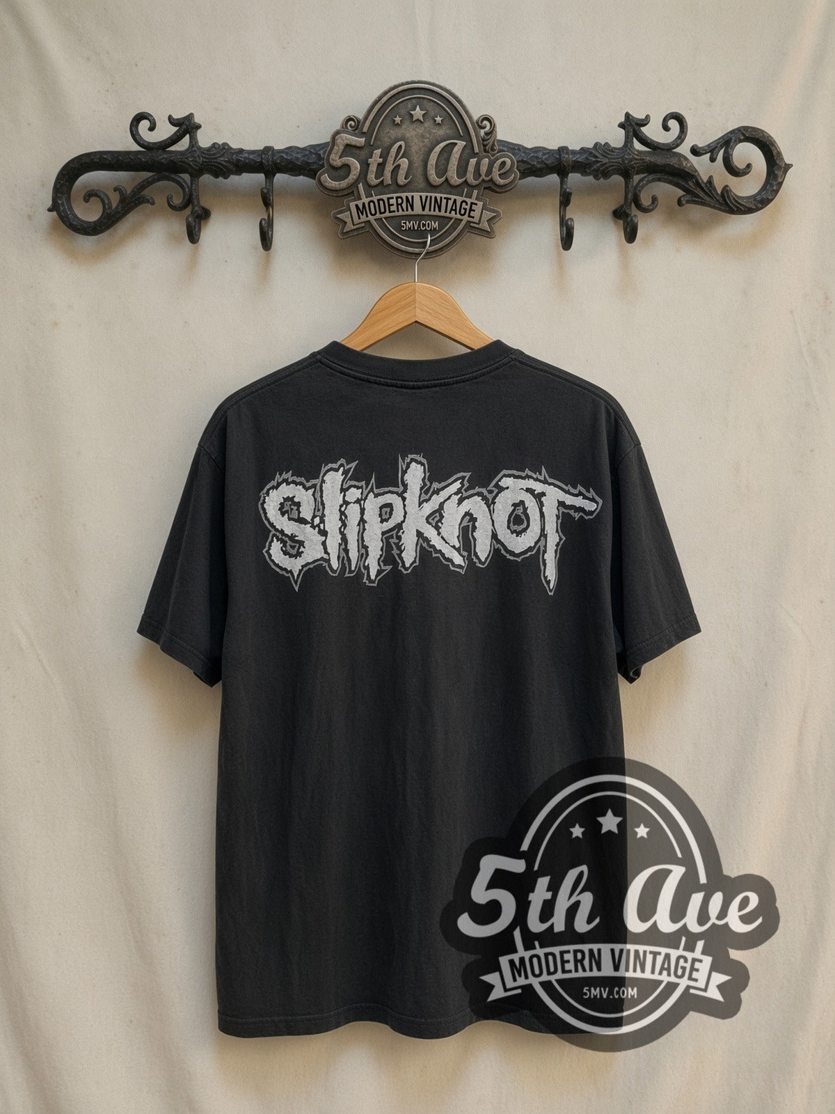 Slipknot Iowa Masks vintage band t-shirt in black, back view on a display rack