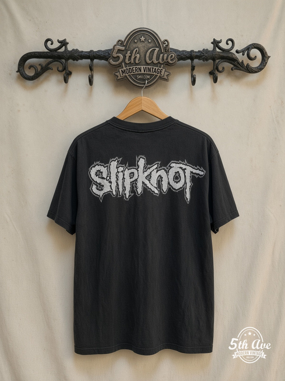 Slipknot – Iowa Masks – Vintage Band T-Shirt — back on locked cream ornate 5th Ave rack