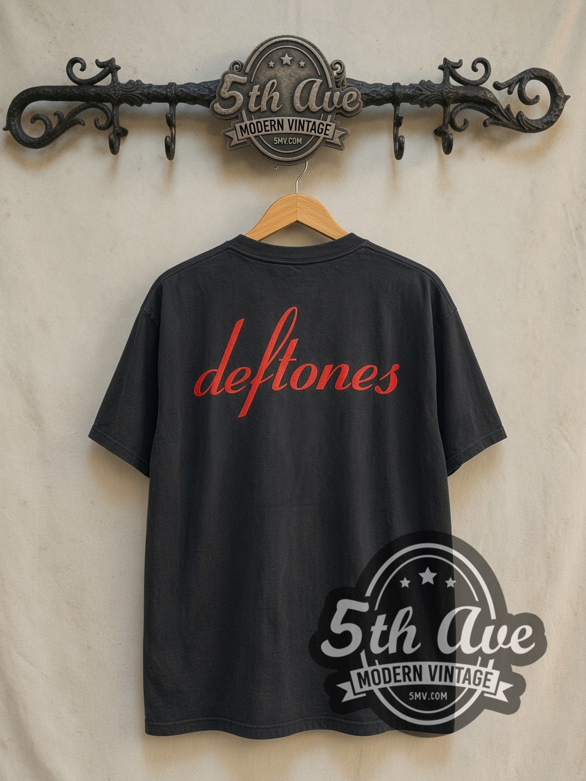 Deftones Around the Fur Red Script vintage band t-shirt in black, back view on a display rack